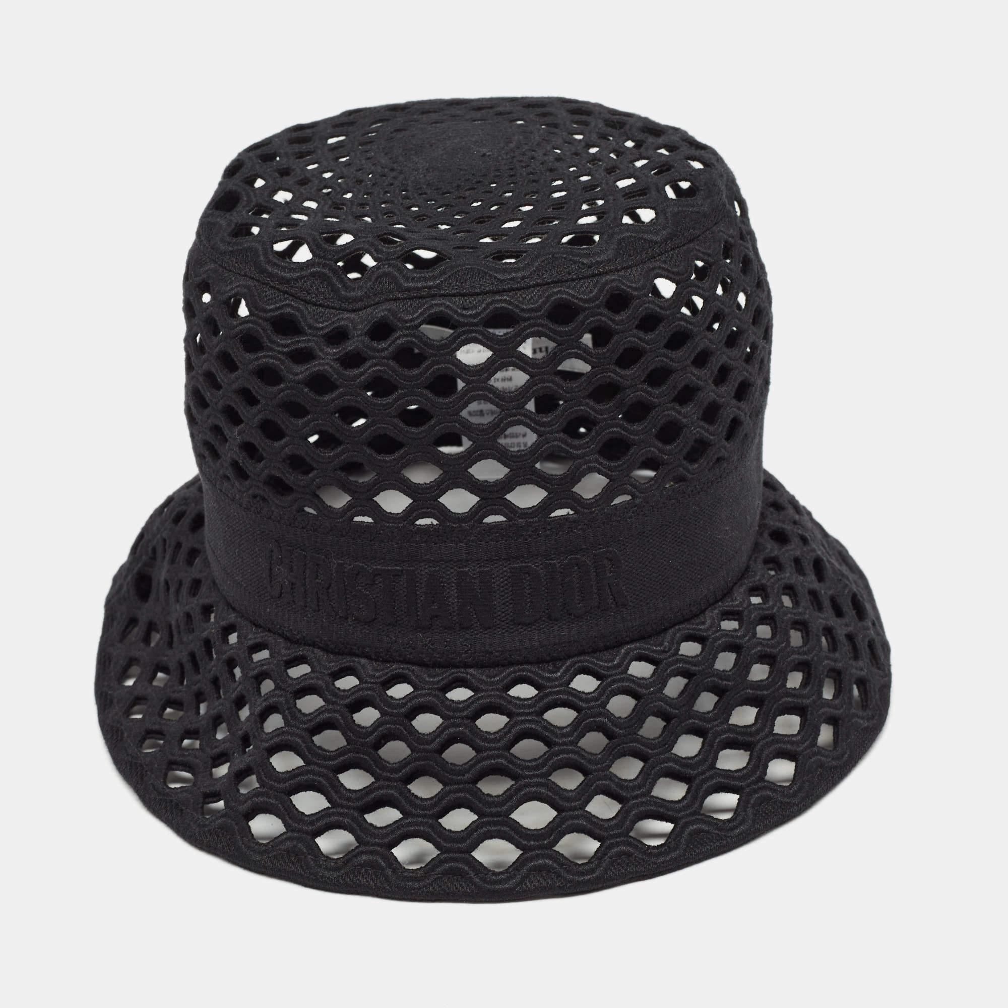 The Dior bucket hat seamlessly combines style and functionality. Crafted from high-quality black mesh, it features the iconic Dior logo embroidered on the front. With a comfortable and breathable design, this hat is a versatile accessory that