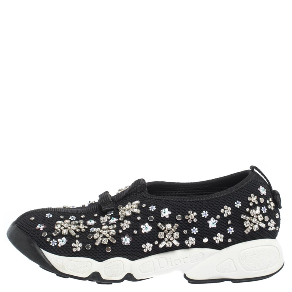 The words 'edgy' and 'ultra-modern' can be readily attributed to this pair from Dior. The sneakers were first introduced as a part of their Haute Couture Spring / Summer 2014 collection. Crafted from mesh, they feature embellishments and rubber