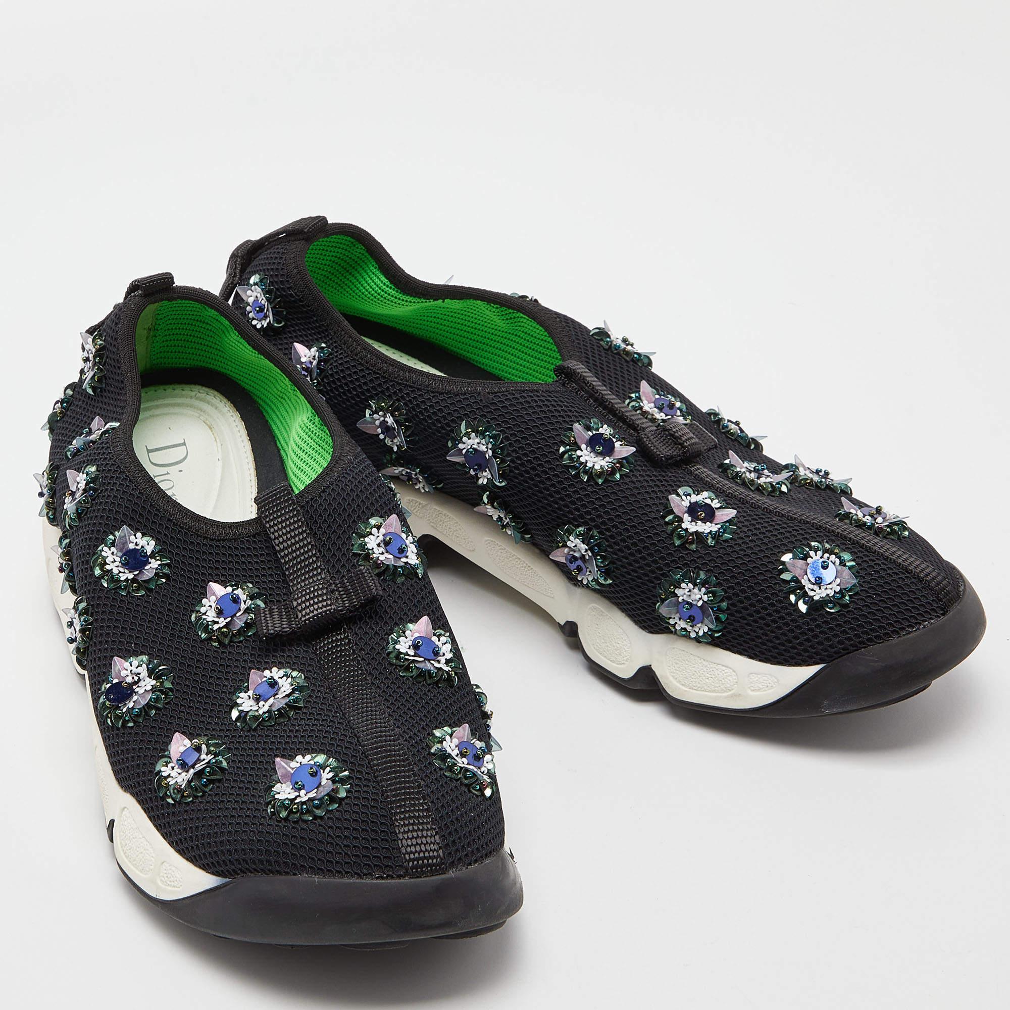 The trend set by these Fusion sneakers from Dior is one you must try. The sneakers are designed with embellishments all over and set on rubber soles that are detailed with subtle branding. They are high in comfort and style, just perfect to be worn