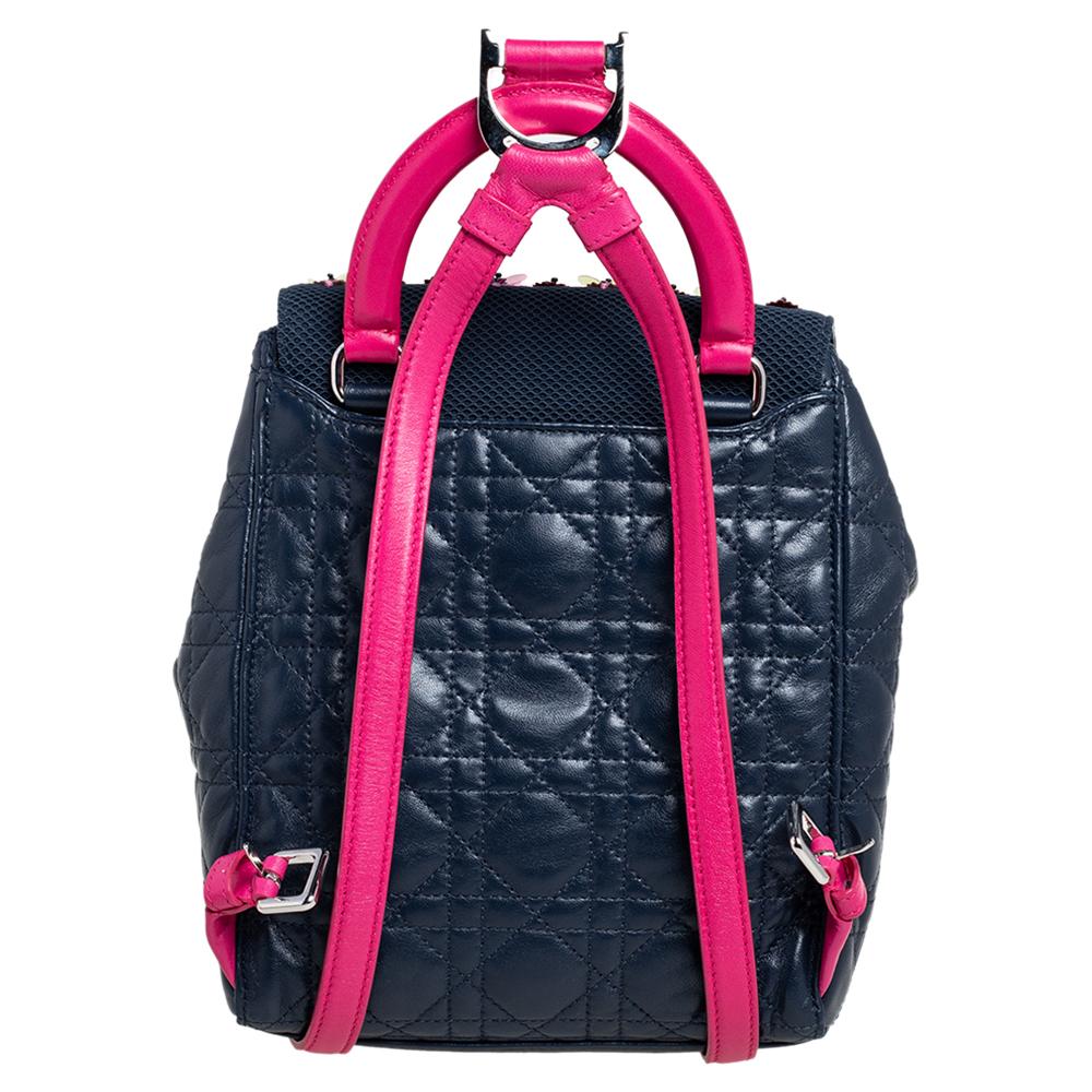 To accompany all your casual outings in the most fashionable way, Dior brings you this Stardust backpack that boasts of fabulous style and outstanding details. It flaunts a navy blue exterior with a flap carrying the brand label and quilt patterns