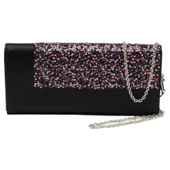 Christian Dior Schwarze Clutch aus Satin und Pailletten Lady Dior Kette