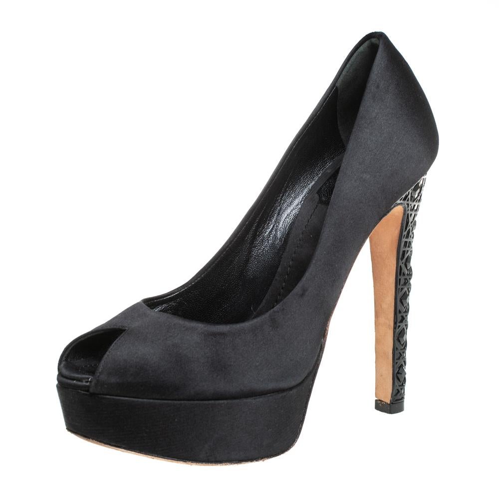 Incorporating luxe and contemporary elements, these black platform pumps from Dior are simply amazing! They have been crafted from satin and styled with peep toes and well-cut vamps. They are endowed with comfortable insoles and elevated on Cannage