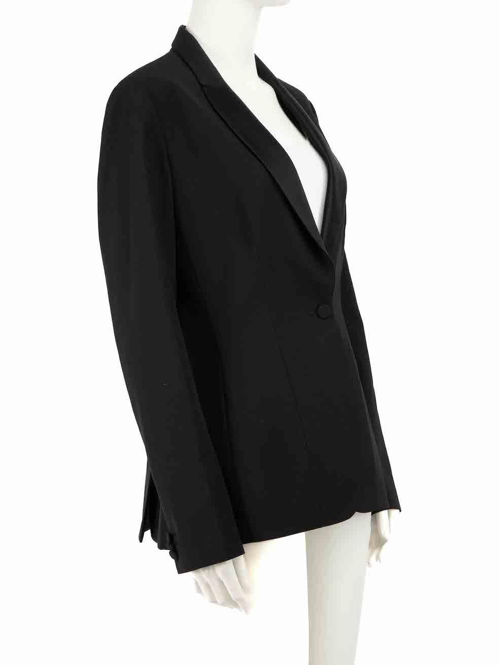 CONDITION is Very good. Minimal wear to blazer is evident. Minimal wear to the left underarm with very light marks to the lining on this used Dior designer resale item.
 
 Details
 Black
 Wool
 Blazer
 Hip length
 Single breasted
 Buttoned cuffs
