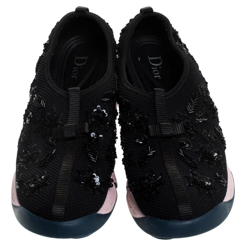 The trend set by these Fusion sneakers from Dior is one you must try. The sneakers are designed with sequin embellishments all over and rubber soles that are detailed with the Dior logo. They are high in comfort and style, just perfect to be worn