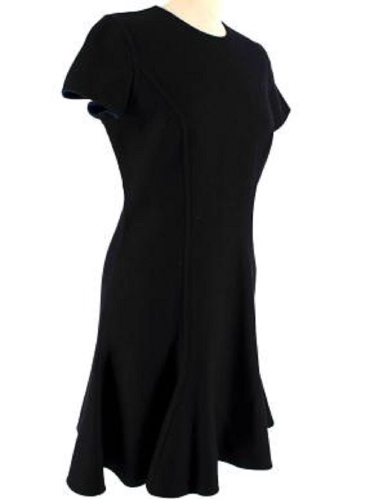 Dior Black Short Sleeve Skater dress 

-Blue lining 
-Round neckline 
-Zip fastening along the back 
-Short sleeve 
-Pleated at the skirt 
-Mid-weight construction 

Material: 

100% Cashmere 

Made in italy  

PLEASE NOTE, THESE ITEMS ARE PRE-OWNED