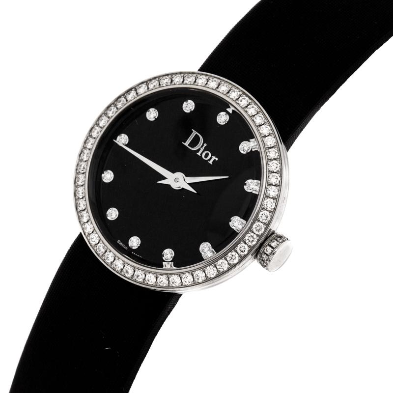 Elegant design and subtle aesthetics pretty much define this exquisite La D De Dior watch from the fashion house of Dior. It is rendered beautifully in a stainless steel case and held by leather straps. The thin bezel surrounding the black dial is