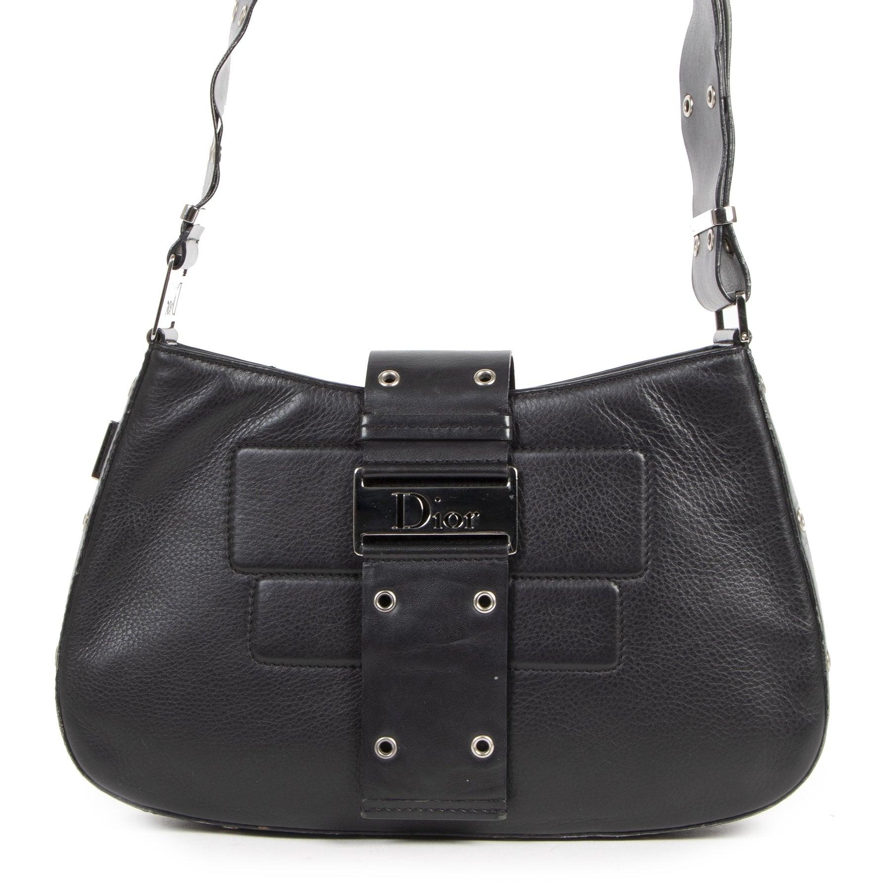 Very good preloved condition

Dior Black Street Chic Bag

This amazing Dior Street Chic Bag is the perfect bag for everyday use! The bag is crafted out of black leather and features silver-tone hardware with the signature Dior logo on it. The small
