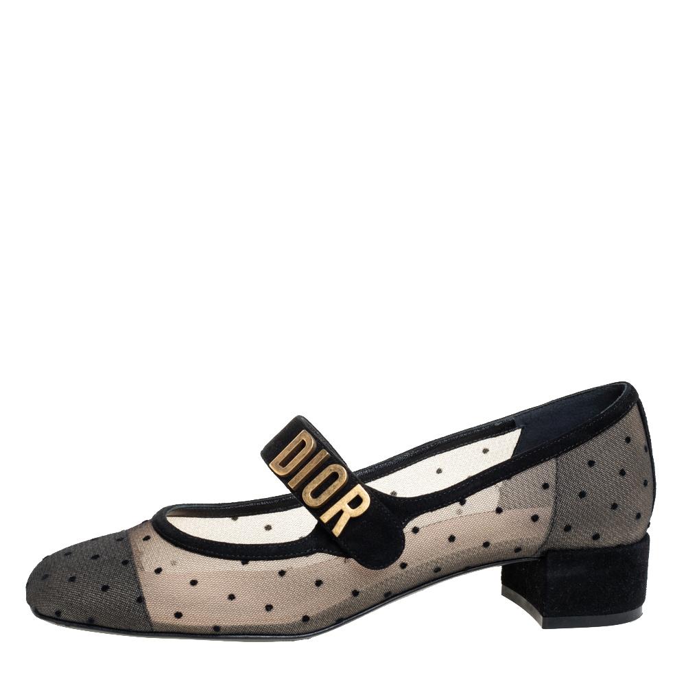 Feminine and sophisticated, these Baby-D pumps by Dior are exquisite. Crafted from mesh & suede, they have an elegant exterior adorned with polka dots and come in a classic shade of black. They are styled with square cap-toes, mary-jane straps with