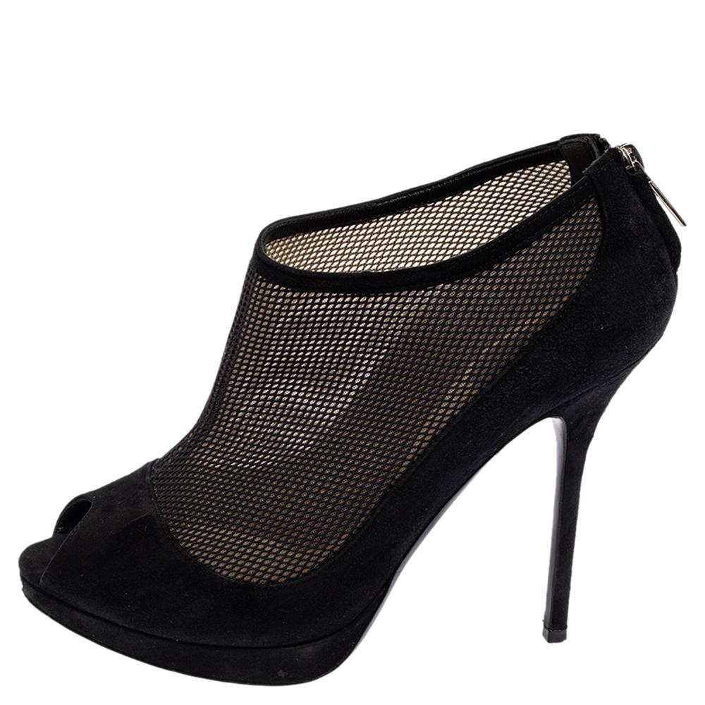 Crafted exquisitely from suede and designed with mesh in a caged design, these Dior booties were built to lift your outfits and your spirits. They feature peep toes, zippers on the counters, and beautifully sculpted 12 cm heels.