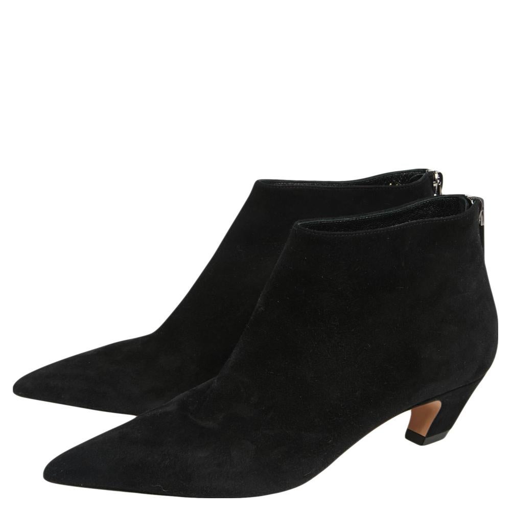 Black boots are closet staples and nothing better than Dior! They are crafted from suede and detailed with counter zippers. The pointed-toe silhouette is raised on distinctive and low heels for the comfort of your feet.

Includes: Original Dustbag