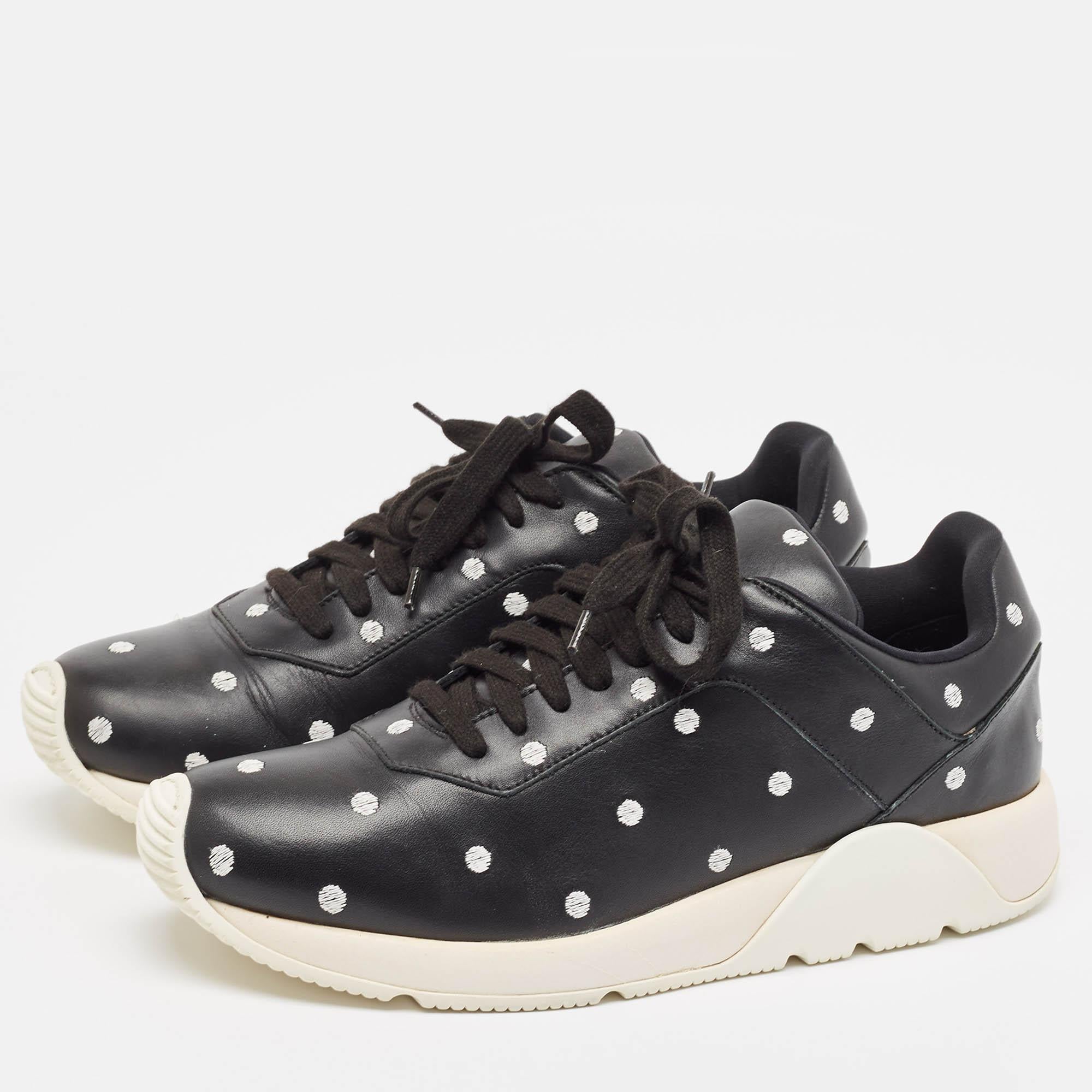 Coming in a classic silhouette these designer sneakers are a seamless combination of luxury comfort and style. These sneakers are finished with signature details and comfortable insoles.