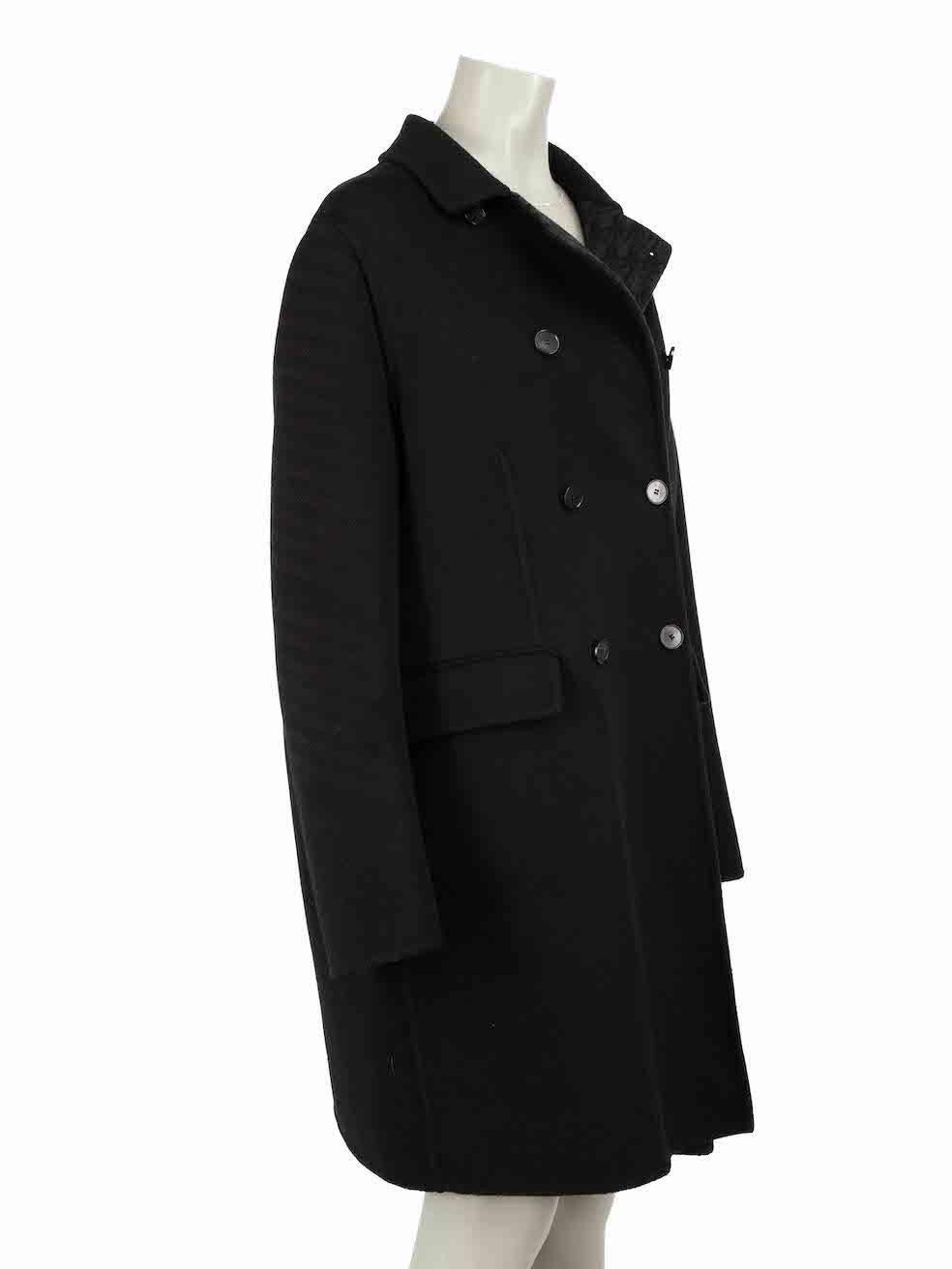 CONDITION is Never worn, with tags. No visible wear to coat is evident on this new Dior designer resale item.
 
Details
Black
Wool
Mid length coat
Double breasted
2x Front side pockets with flap
Oblique pattern lining
 
Made in Italy
Composition
99%