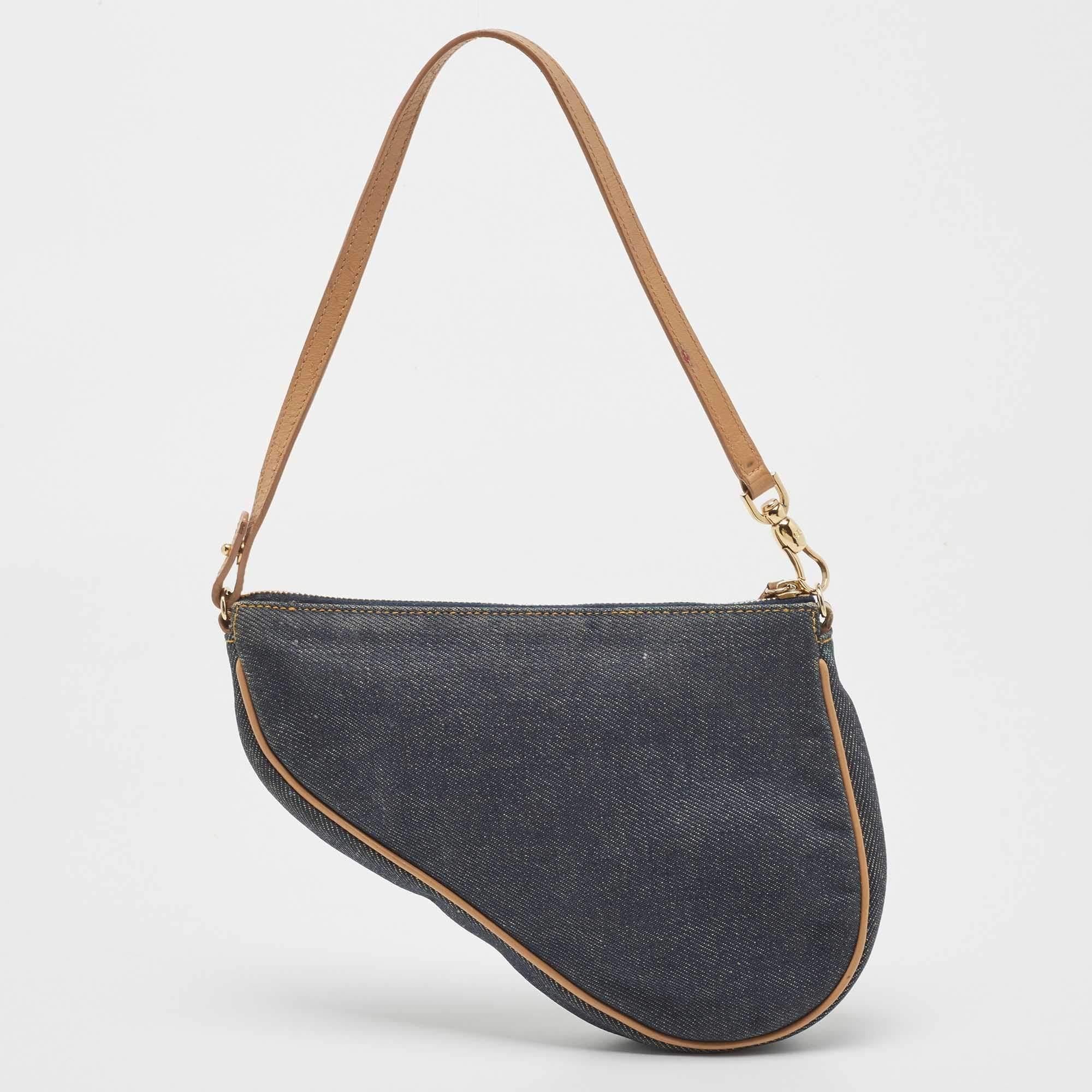 An example of timeless style and great design ideas, Dior's Saddle is sought after for all the right reasons. This bag for women is crafted using leather along with denim and is impressive with its fashionable design. Lined with nylon, it will keep