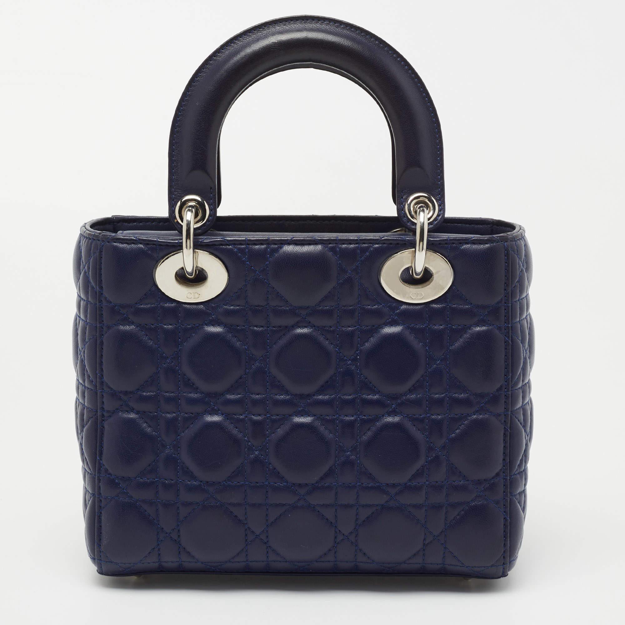 The Lady Dior tote is a Dior creation that has gained recognition worldwide and is today a coveted bag that every fashionista craves to possess. This blue tote has been crafted from leather, and it carries the signature Cannage quilt. It is equipped
