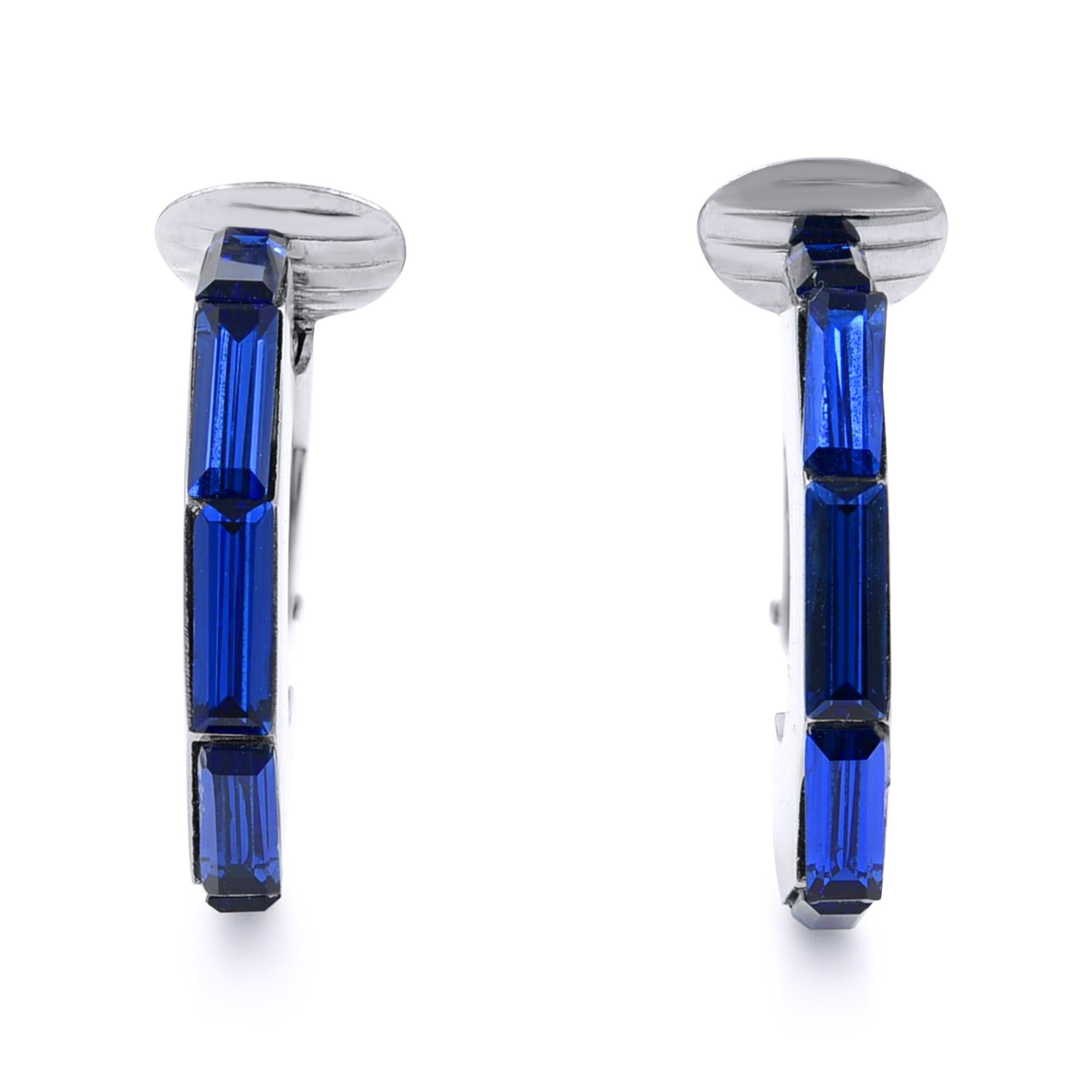 Presenting Dior baguette cut blue crystal hoop earrings. Crafted in 925 silver tone hardware. Lightweight and super fun to wear. Comes in great pre-owned condition. Total weight: 5.20 gms. Original packaging not included. 