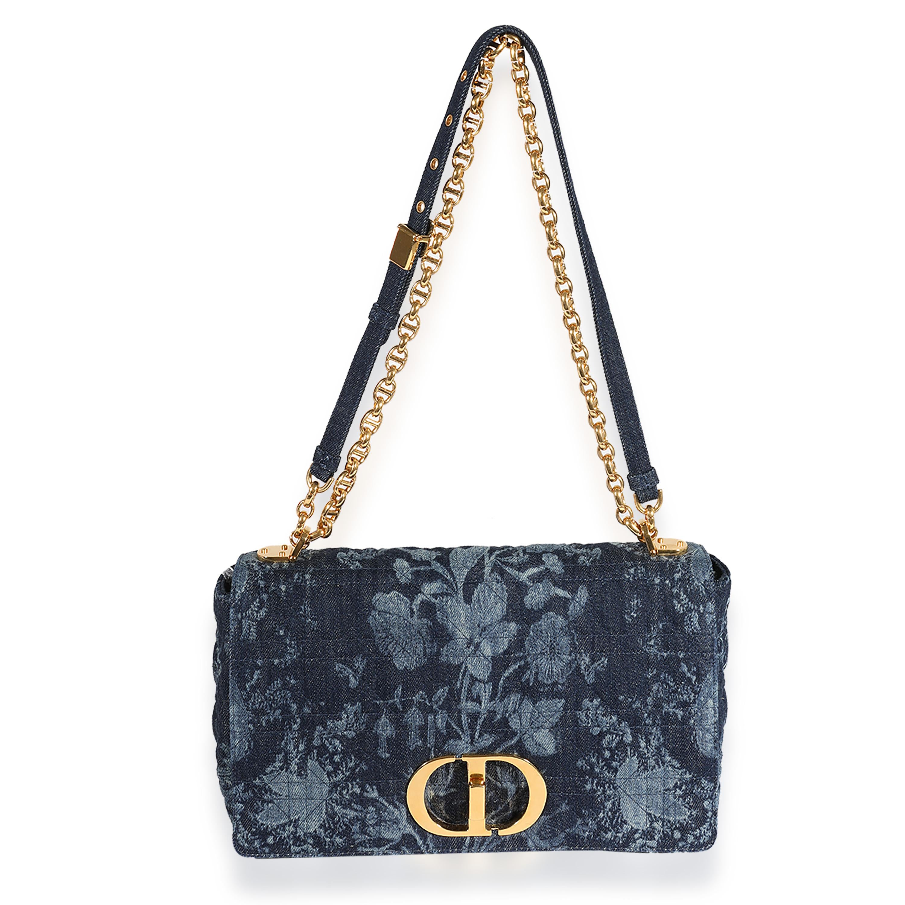 Listing Title: Dior Blue Floral Denim Large Caro Chain Bag
SKU: 123247
MSRP: 4700.00
Condition: Pre-owned 
Handbag Condition: Very Good
Condition Comments: Very Good Condition. Scratching to hardware. Mark at exterior base. Light discoloration