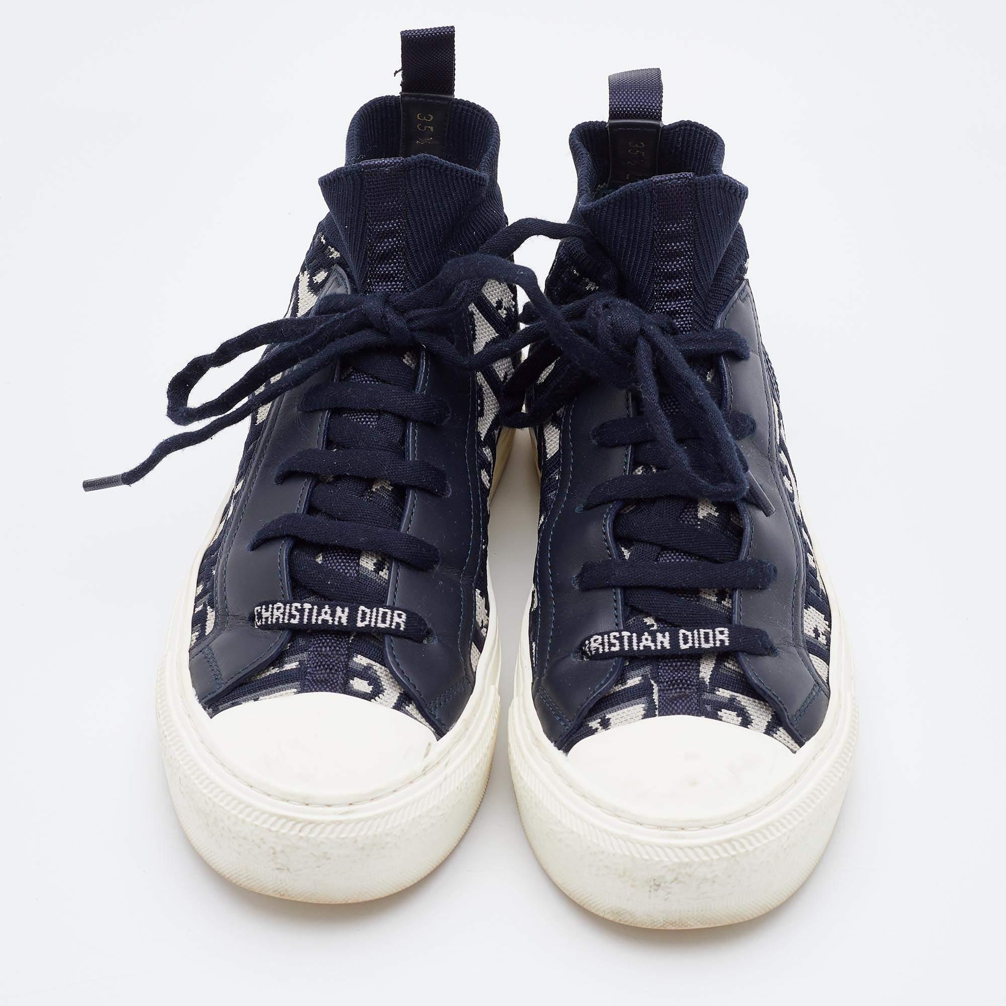 Packed with style and comfort, these Dior sneakers are gentle on the feet so that you can glide through the day. They have a sleek upper with lace closure, and they're set on durable rubber soles.

Includes: Original Dustbag

