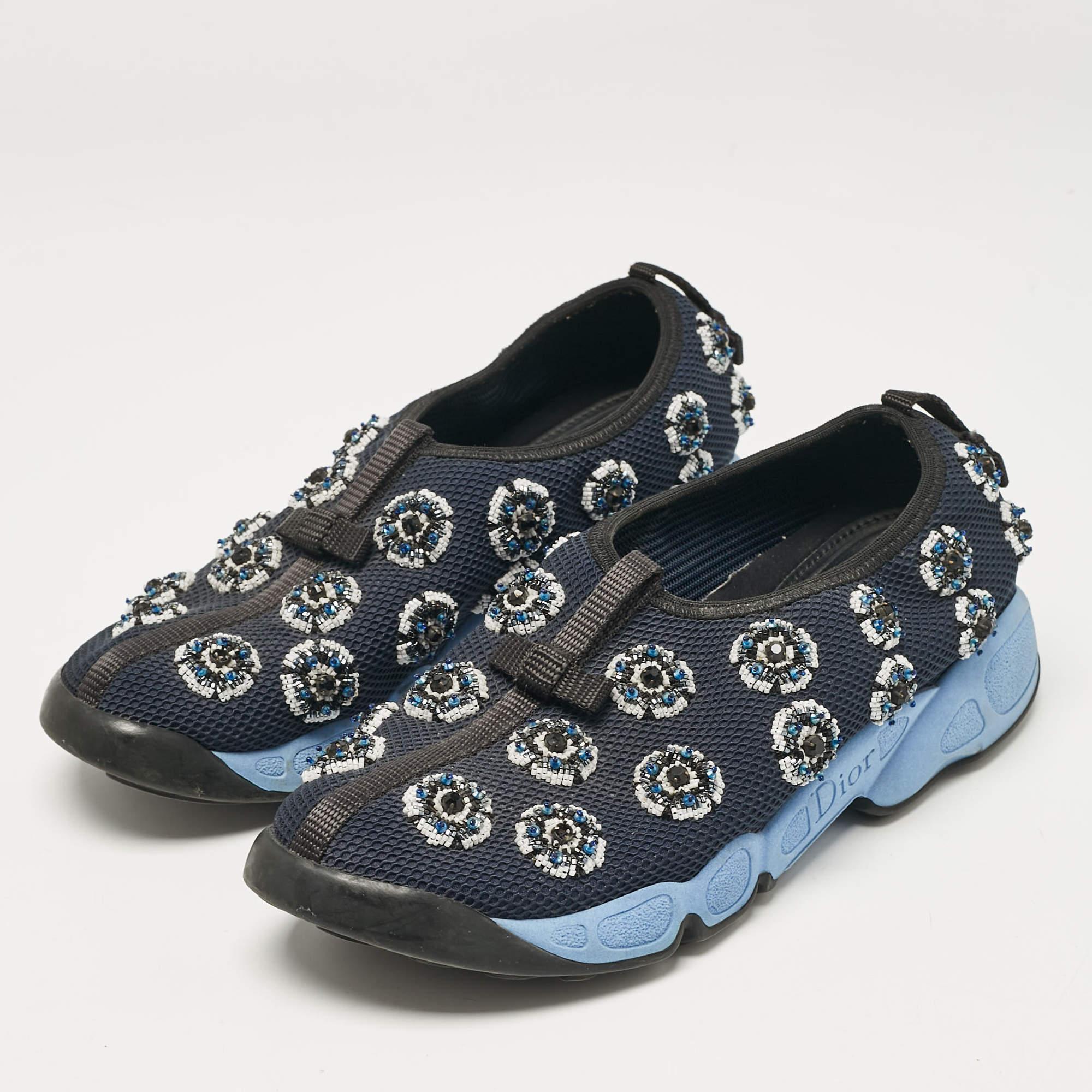Coming in a classic silhouette  these designer sneakers are a seamless combination of luxury  comfort  and style. These sneakers are finished with signature details and comfortable insoles.