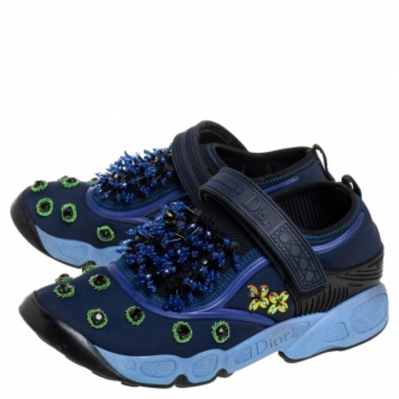 The words 'edgy' and 'ultra-modern' can be readily attributed to this pair from Dior. The sneakers were first introduced as a part of their Haute Couture Spring / Summer 2014 collection. Crafted from nylon and mesh, they feature embellishments,