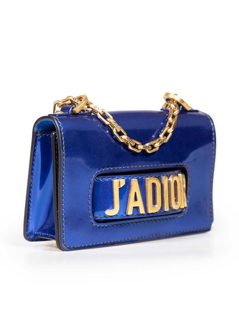 CONDITION is Very good. Minimal wear to bag is evident. Peeling to the coating on the right and left corners of the flap. Marks are seen on the rear on both side on this used Dior designer resale item.
 Details
 Model: J'adior
 Blue
 Patent leather
