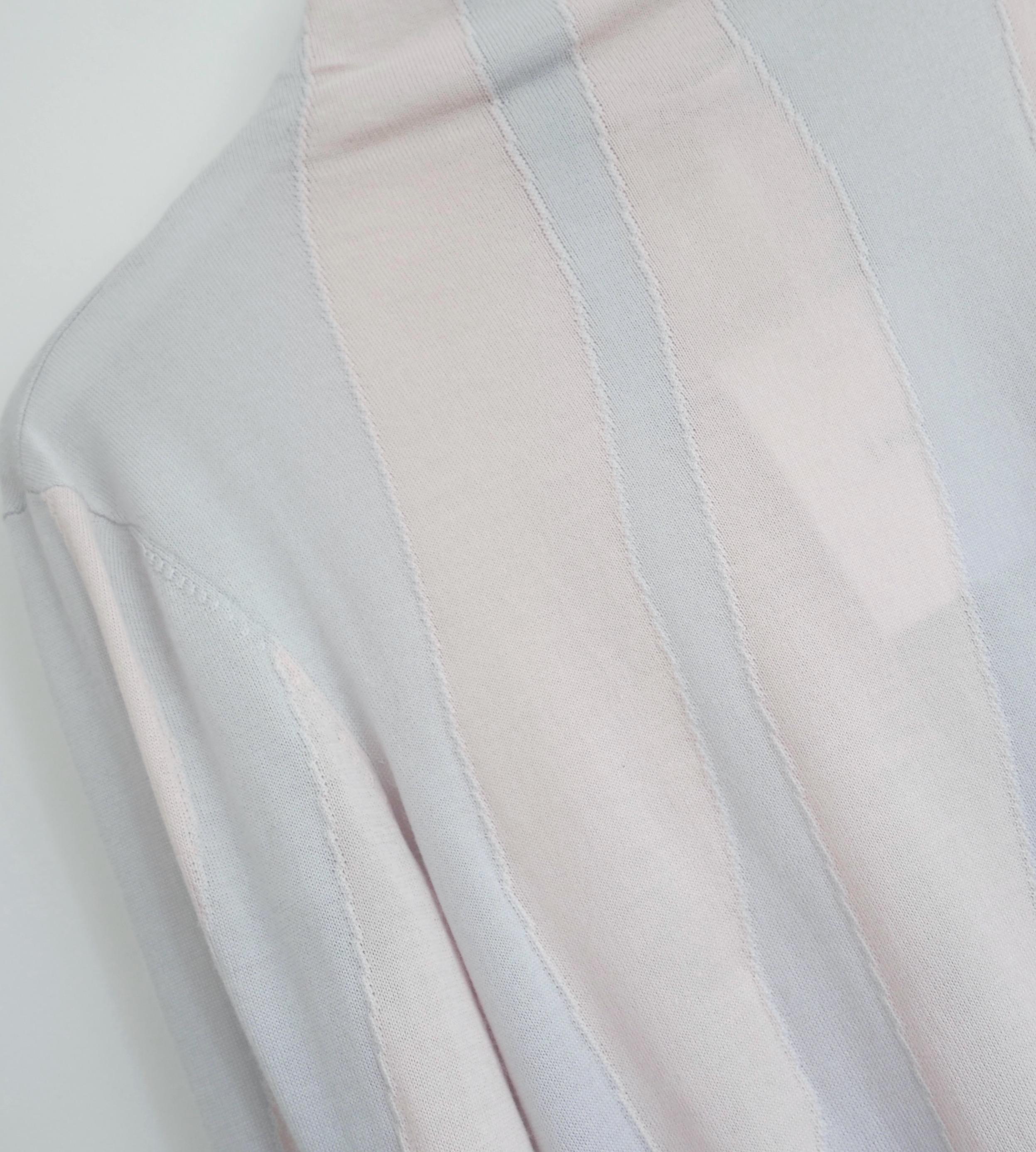 Absolutely gorgeous Dior sweater  from the Fall 2015 collection. Look 4 on the runway.  Bought for £1750 and new with tag/spare yarn.   Made from super soft pale blue and pink cashmere and silk (70:30) with a sinuous, textured waved knit. It has a