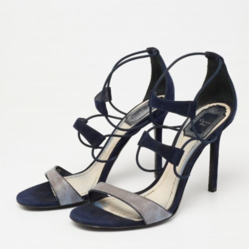 Open toes, stretchable straps, and thin heels make these Dior sandals an absolute must-have. The shoes are made of blue suede as well as python-embossed leather and they look even better on the feet!