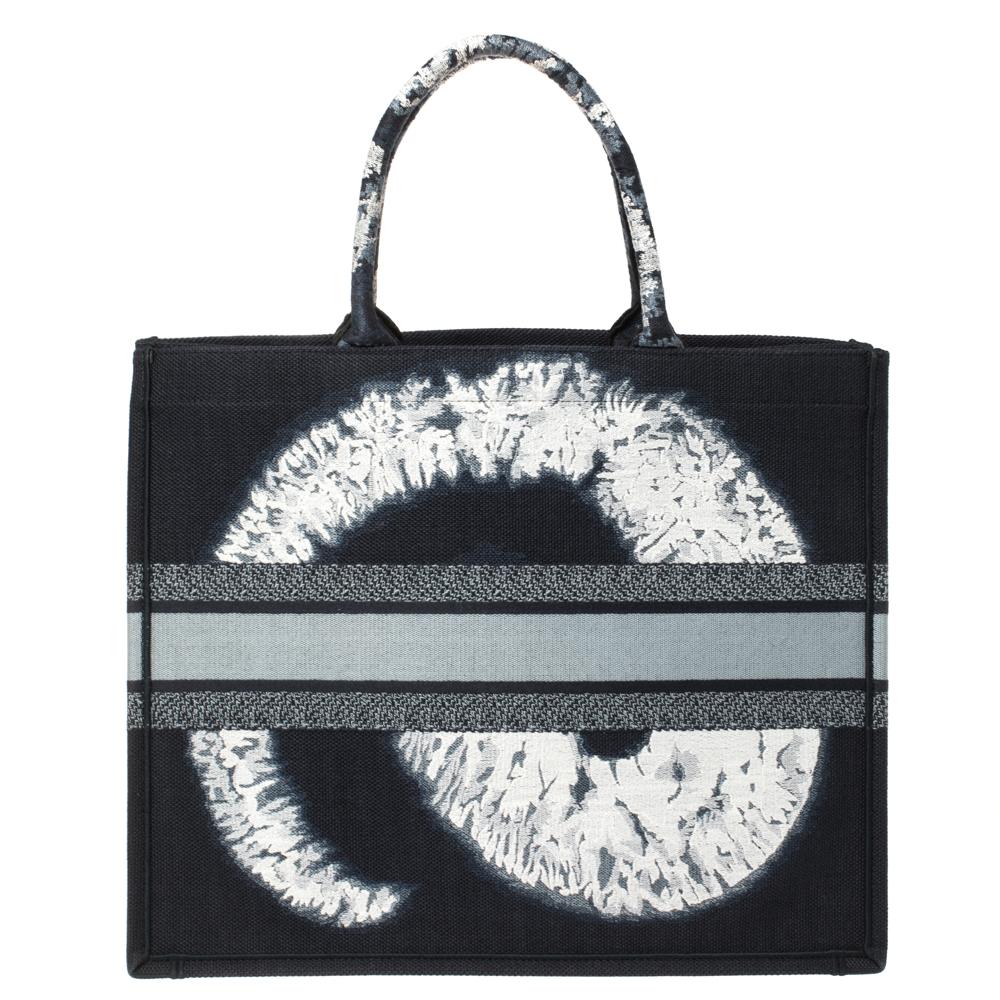 The Book tote by Dior became a cult-favorite instantly after it was introduced. The sublime aesthetics and silhouette of the tote reflect everything that Dior's brand DNA stands for. Designed to carry all your daily essentials, the creation is