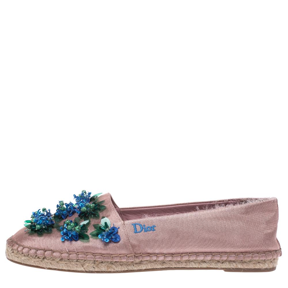 These espadrilles from Dior look lovely! The pink loafers are crafted from fabric and feature round toes, floral embellished vamps, comfortable leather-lined insoles and espadrille soles. Pair them with a shirt and skinny jeans or a dress for a