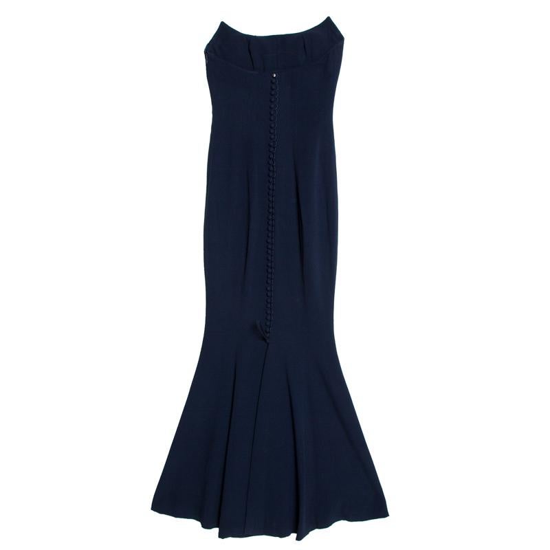 A fabulous mixture of comfort and style, you cannot go wrong with this Dior gown. It is made from quality fabrics and designed in a strapless cut. This navy blue gown is sure to be your companion season after season.

Includes
The Luxury Closet