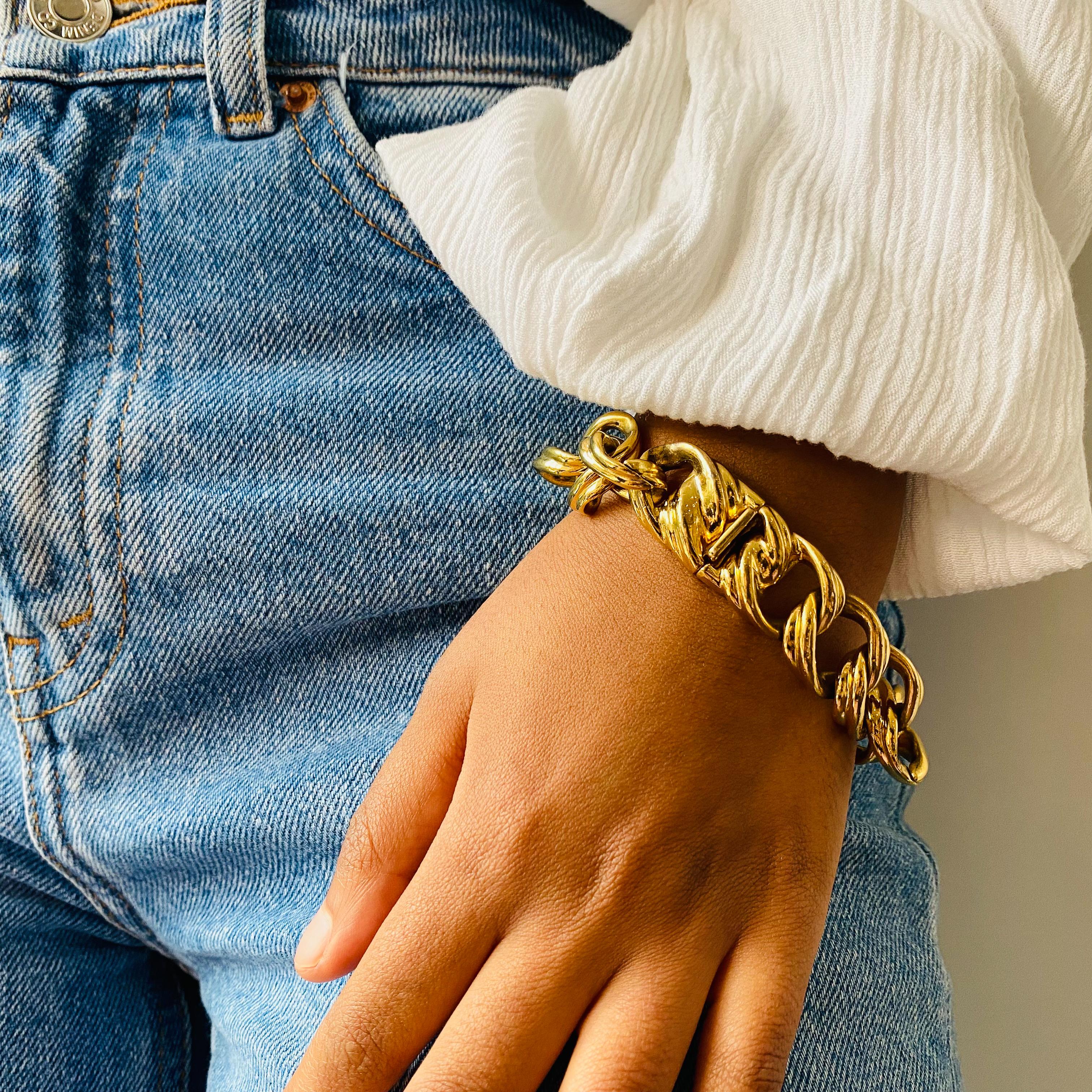 Christian Dior Vintage 1980s Bracelet

Super cool chunky gold plated articulated bracelet from Dior, still one of the world's most desirable labels. Made in Germany with classic 80s styling, this bracelet has timeless contemporary appeal. Stack for