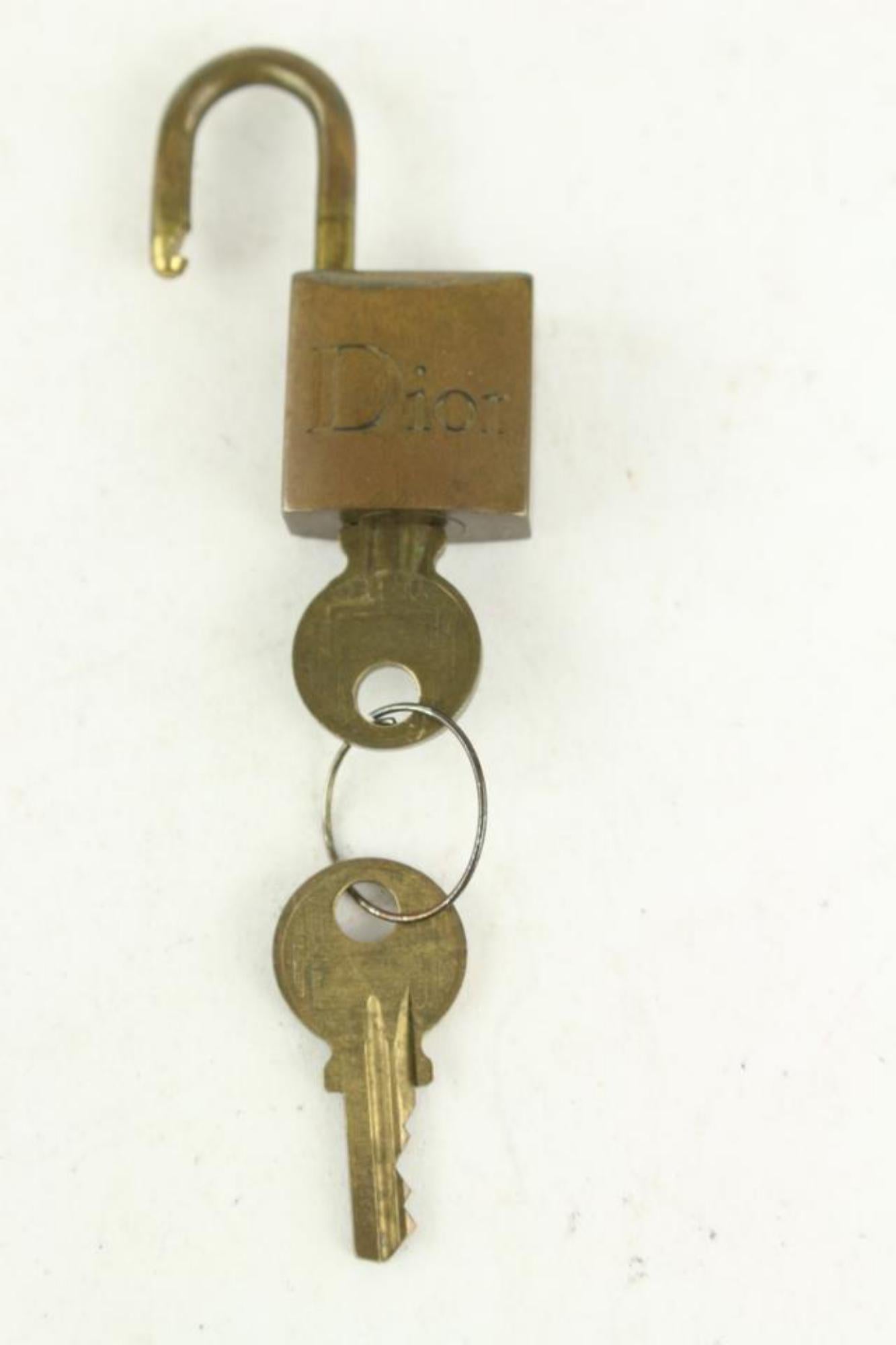 Women's or Men's Dior Brass Logo Lock and Key Padlock Key Bag Charm 4DR1028 For Sale