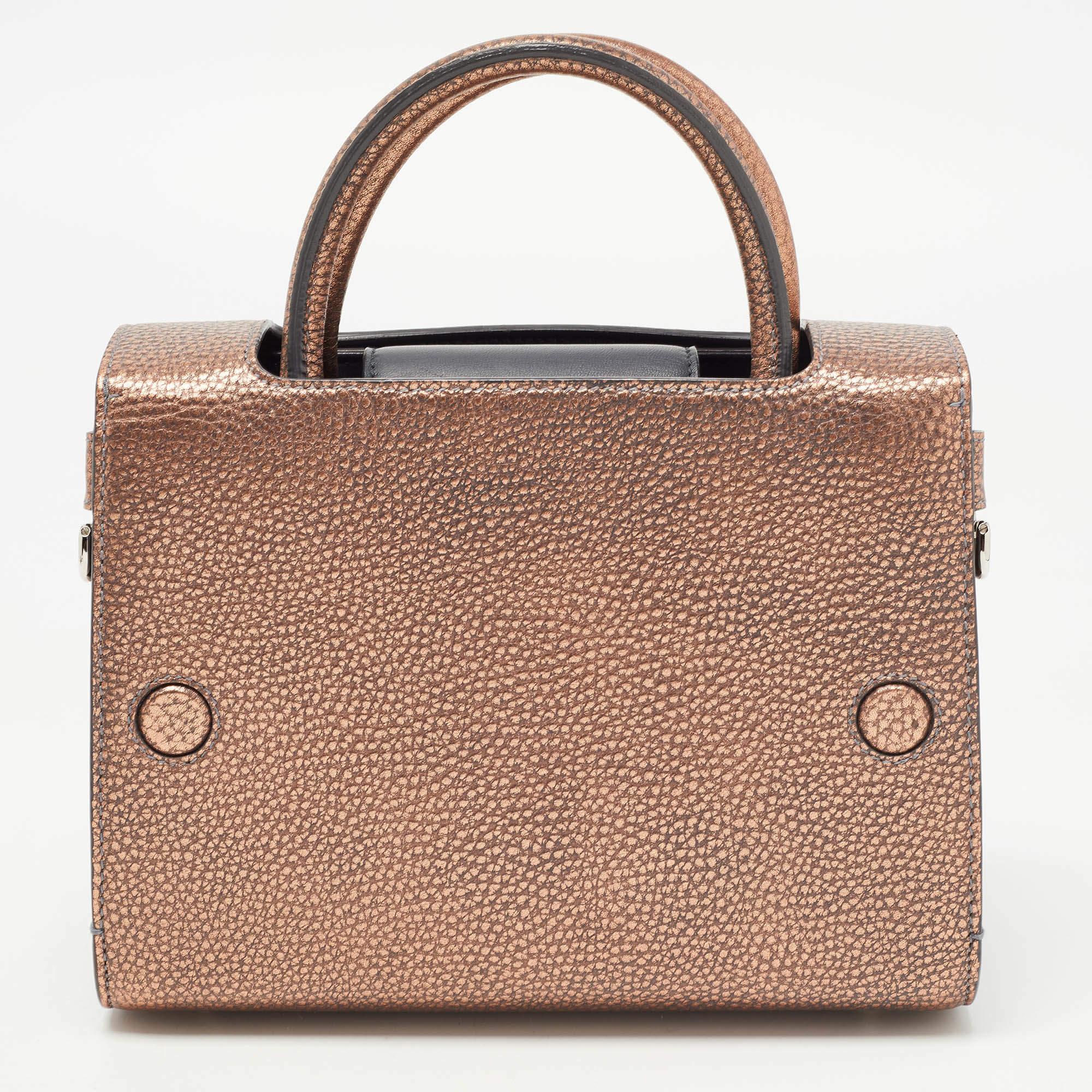 Every stitch and detail on this Diorever bag gives high praise to quality craftsmanship and validates the painstaking effort that goes into making a handbag art as fine as this. Structured to perfection using the finest leather and designed with a