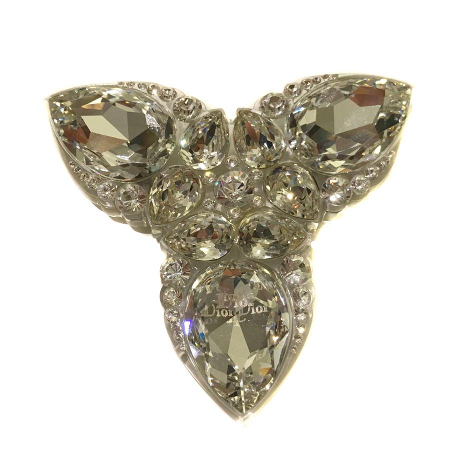 Very beautiful CHRISTIAN DIOR brooch set with 3 large Swarovski diamonds, in the form of faceted drops surrounded by medium and small round and drop-shaped diamonds, are encrusted in a transparent plexi. DIOR inscription on one of the large