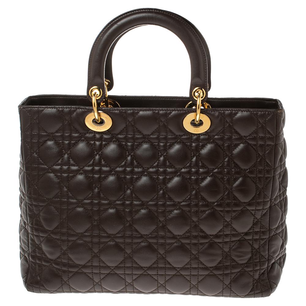 The Lady Dior tote is a Dior creation that has gained recognition worldwide and is today a coveted bag that every fashionista craves to possess. This brown tote has been crafted from leather and it carries the signature Cannage quilt. It is equipped