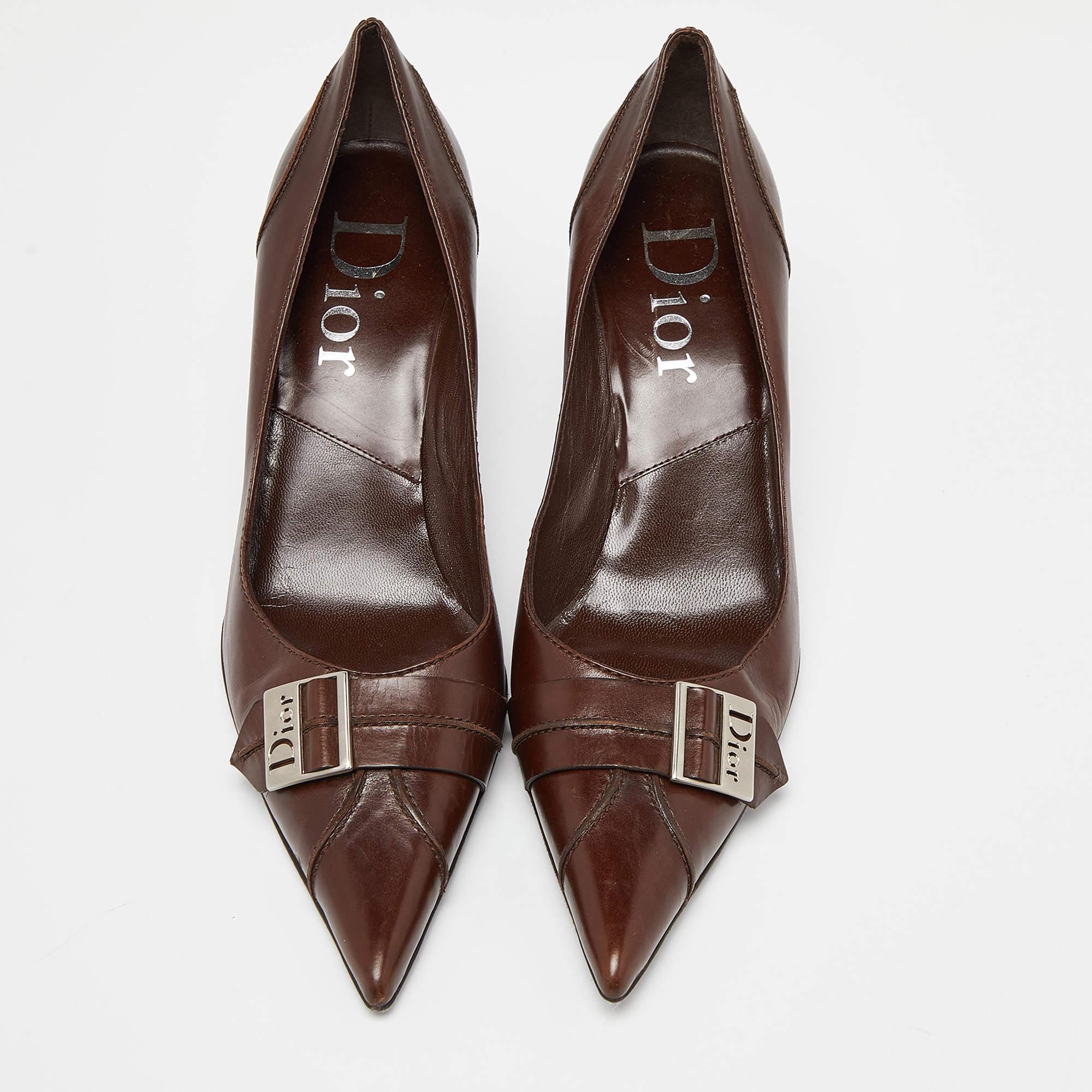 These Dior 'Cherie' pumps are designed in iridescent brown-hued suede with 8cm high heels and pointed toes. They make a perfect partner to trousers or pantsuits as the shade beautifully peeps out of the hemline. Carry a matching clutch to complete
