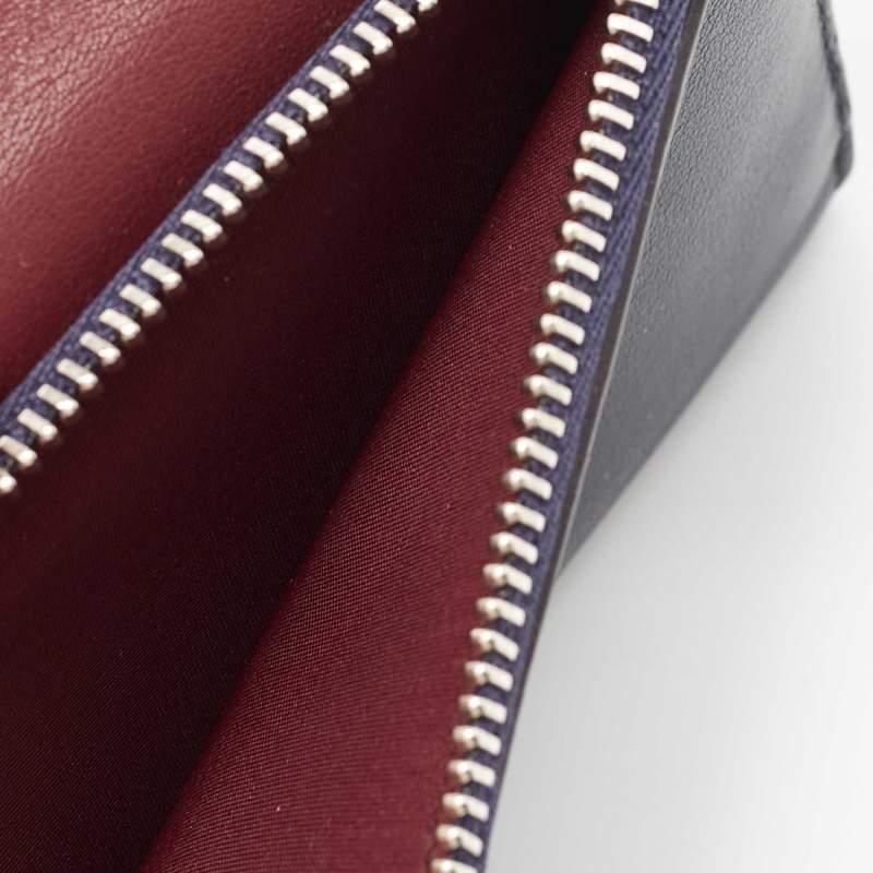 Dior - Portefeuille enveloppant en cuir bourgogne/bleu foncé Diorissimo en vente 4