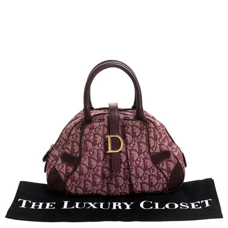 burgundy dior saddle bag