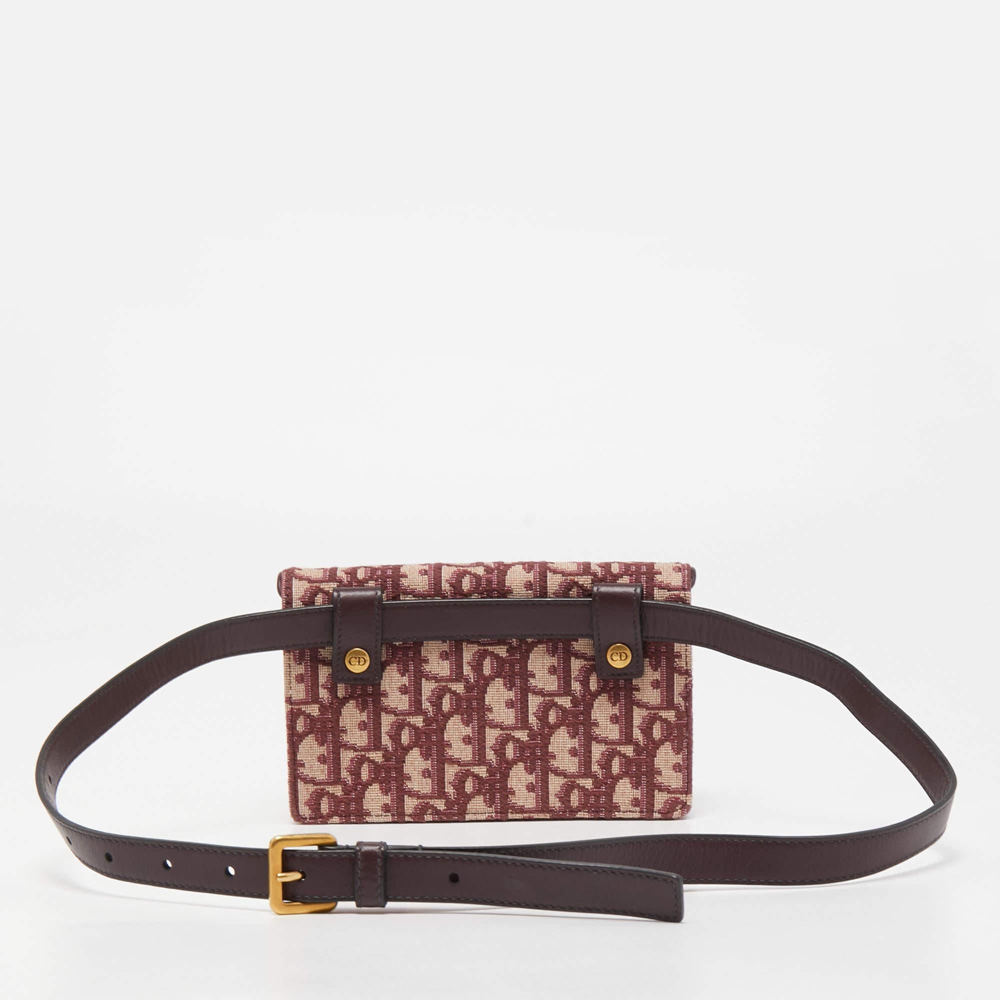 Designed to be carried around the waist or by hand, this Saddle belt bag by Dior speaks of all things being fashionable. It is made from oblique canvas and designed in the likeness of the brand's famous Saddle bag. The bag has a removable leather