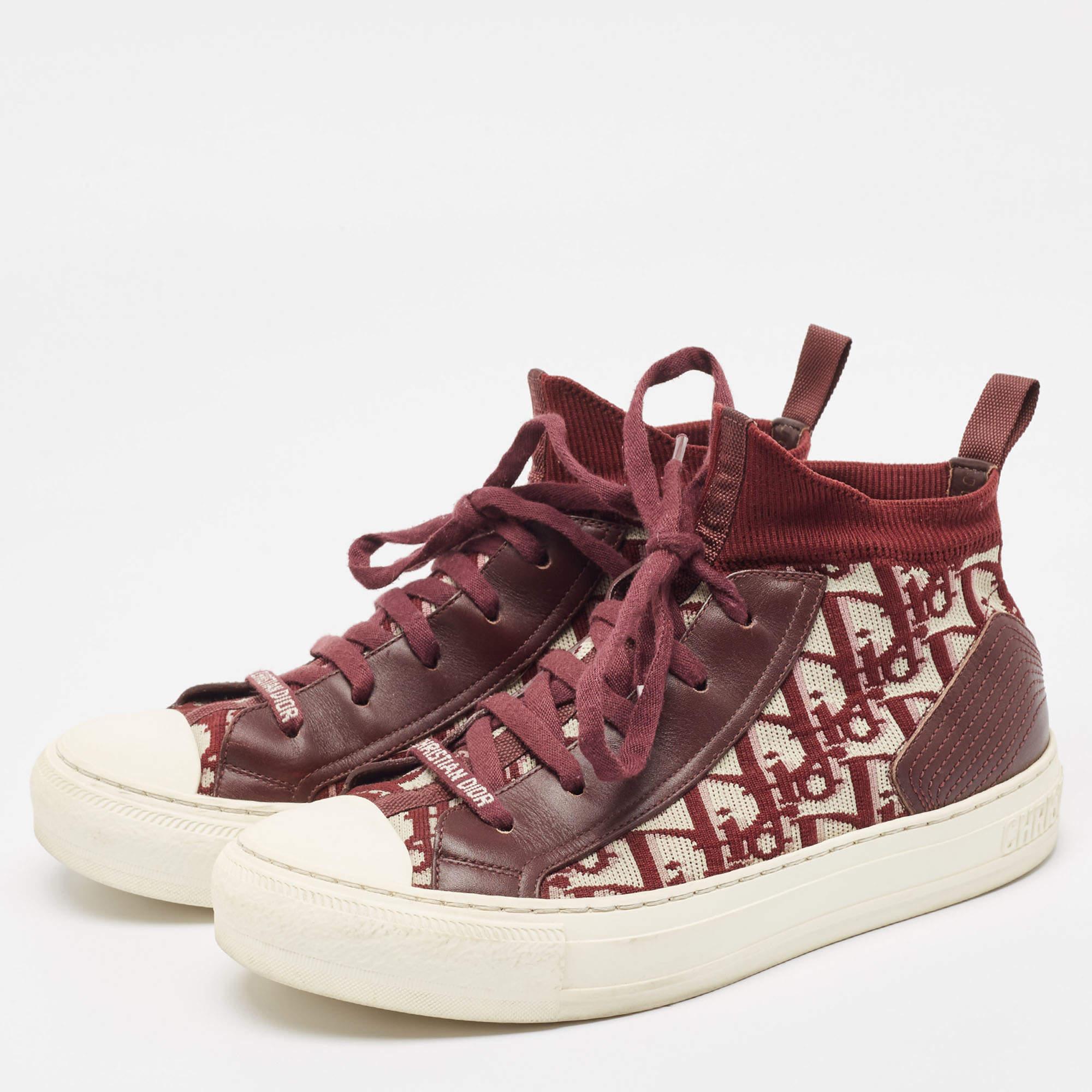 Elevate your footwear game with these designer sneakers. Combining high end aesthetics and unmatched comfort these sneakers are a symbol of modern luxury and impeccable taste.