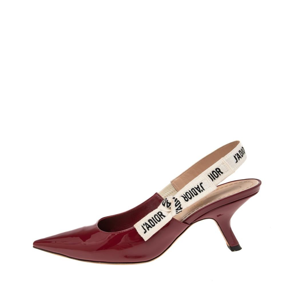 You'll definitely receive compliments wherever you go when you step out in these lovely pumps from Dior. The burgundy pumps are crafted from patent leather and feature pointed toes. They flaunt 'J'adior' ribbons and come equipped with comfortable
