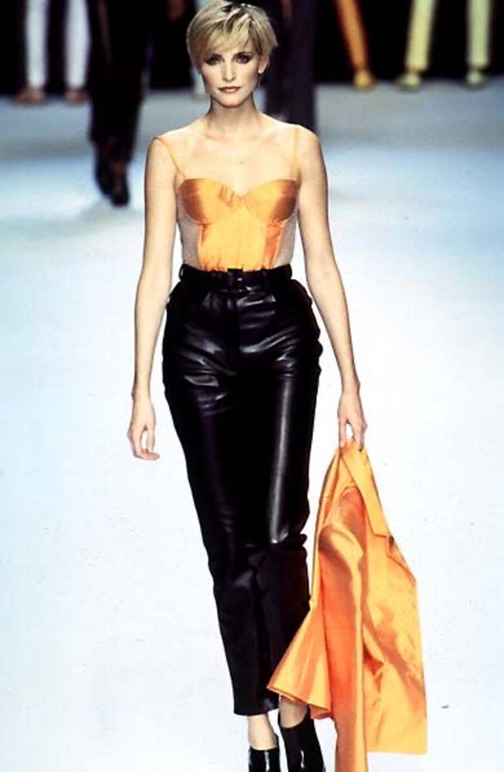 Amazing Christian Dior by Gianfranco Ferre Spring Summer 1997 red leather pants as seen on the runway in black on supermodel Nadja Auermann. These high waited red leather pants also made an appearance in one of Gianfranco Ferre’s earlier collections
