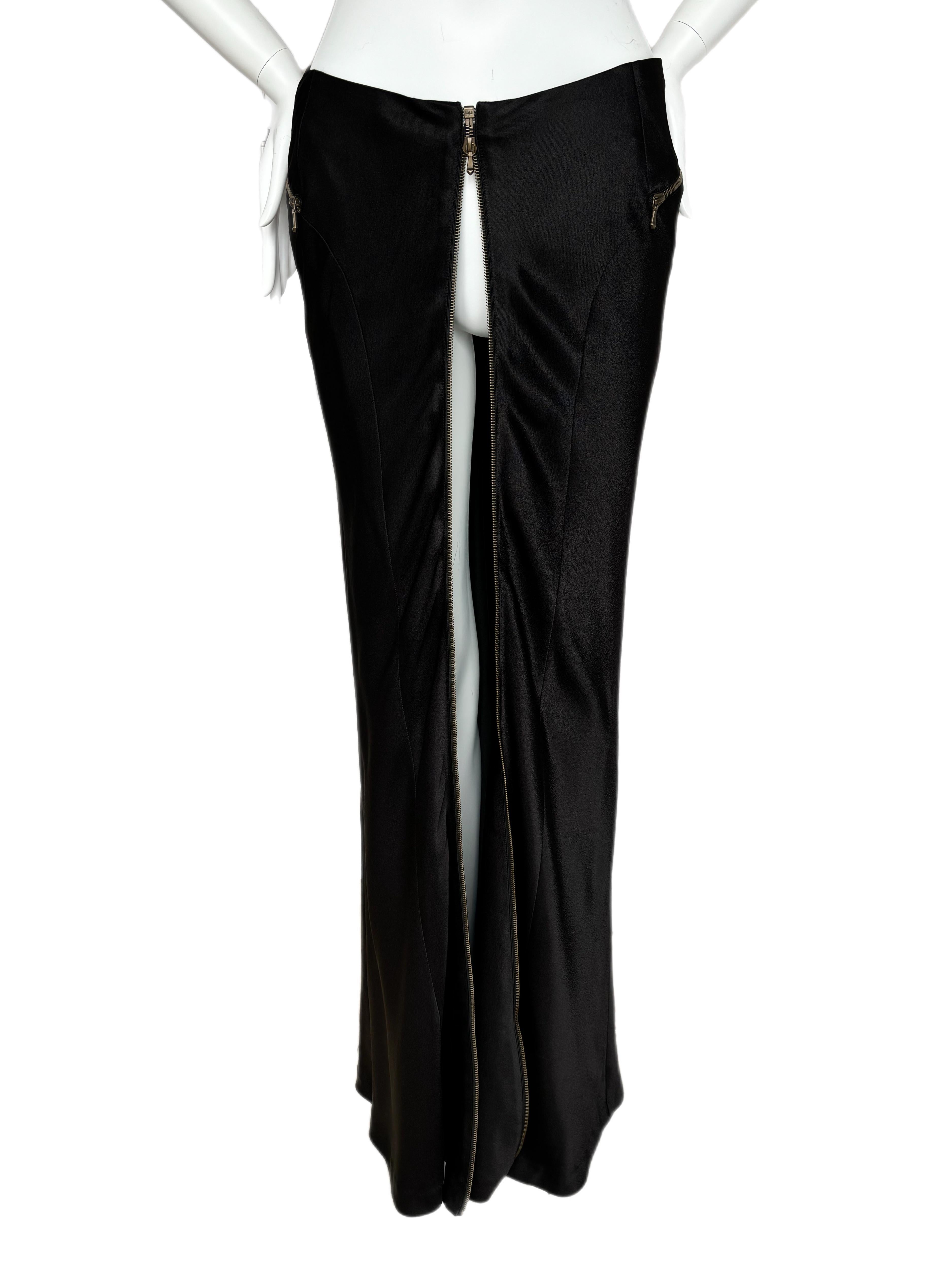 John Galliano for Christian Dior
FW00
Vintage
Jet black with muted gold toned zipper
Size F40
Excellent condition, no flaw to note

Measurements in inches laying flat: length 44, top waist 15, hips 17

FINAL SALE