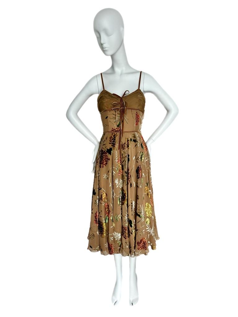 John Galliano for Christian Dior
SS06
Vintage
Tight bodice with fit and flare
Size F36
Pristine
Measurements in inches laying flat: length 46, pit to pit 14 - 15, rib area 12 - 13, waist 14 
The details on this Dior dress are insane. The colors of
