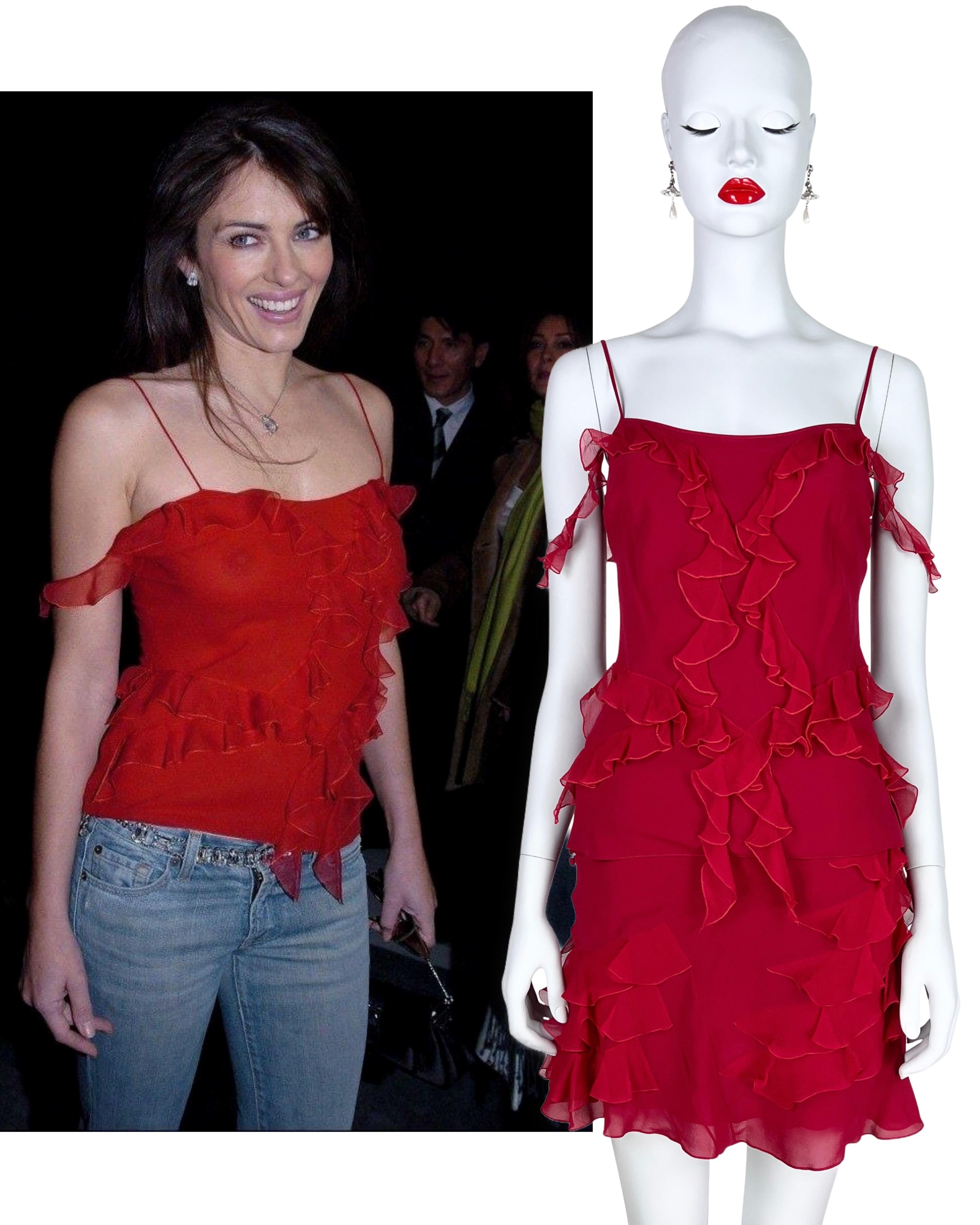 From QV Archive:

Bias cut silk crepe chiffon
A John Galliano signature row of silk buttons on the skirt
As seen on Liz Hurley attending a front row of a Dior show in 2003
Size FR 36 or US 4, fits true to size
Excellent vintage condition 