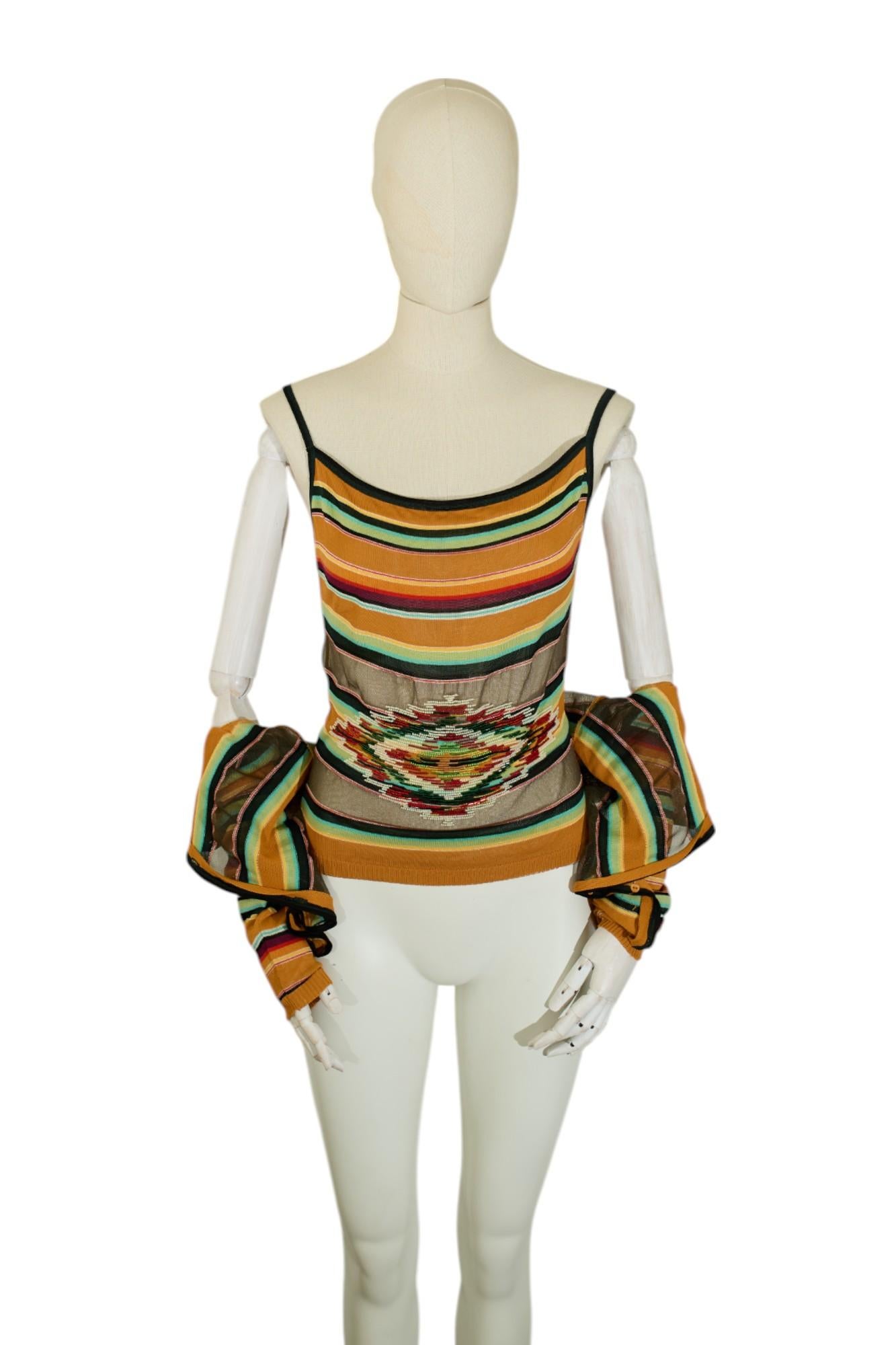 Stunning twin set by John Galliano from his spring summer 2002 collection featuring beaded details. In great condition, please refer to the pictures. 

Brand: Dior
Collection: S/S 2003
Material: Multi
Size: Cardigan IT 36, Tanktop IT 38
Origin: Made