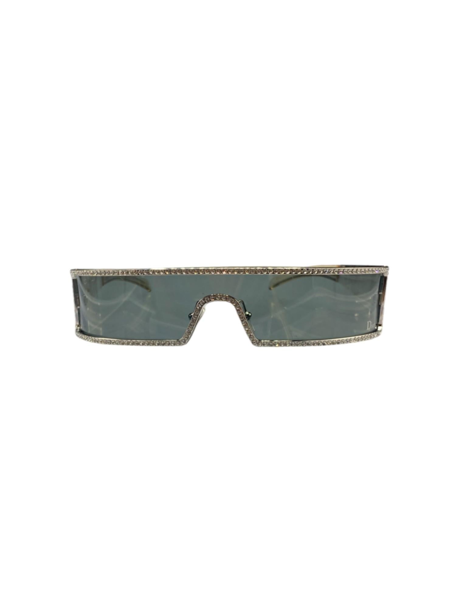 The most iconic pair of the 'Punk' sunglasses by John Galliano for Dior for his S/S 2003 collection. In excellent condition, none of the crystals are missing. There are also no scratches on the lenses.


Brand: Dior
Collection: S/S 2003
Material: