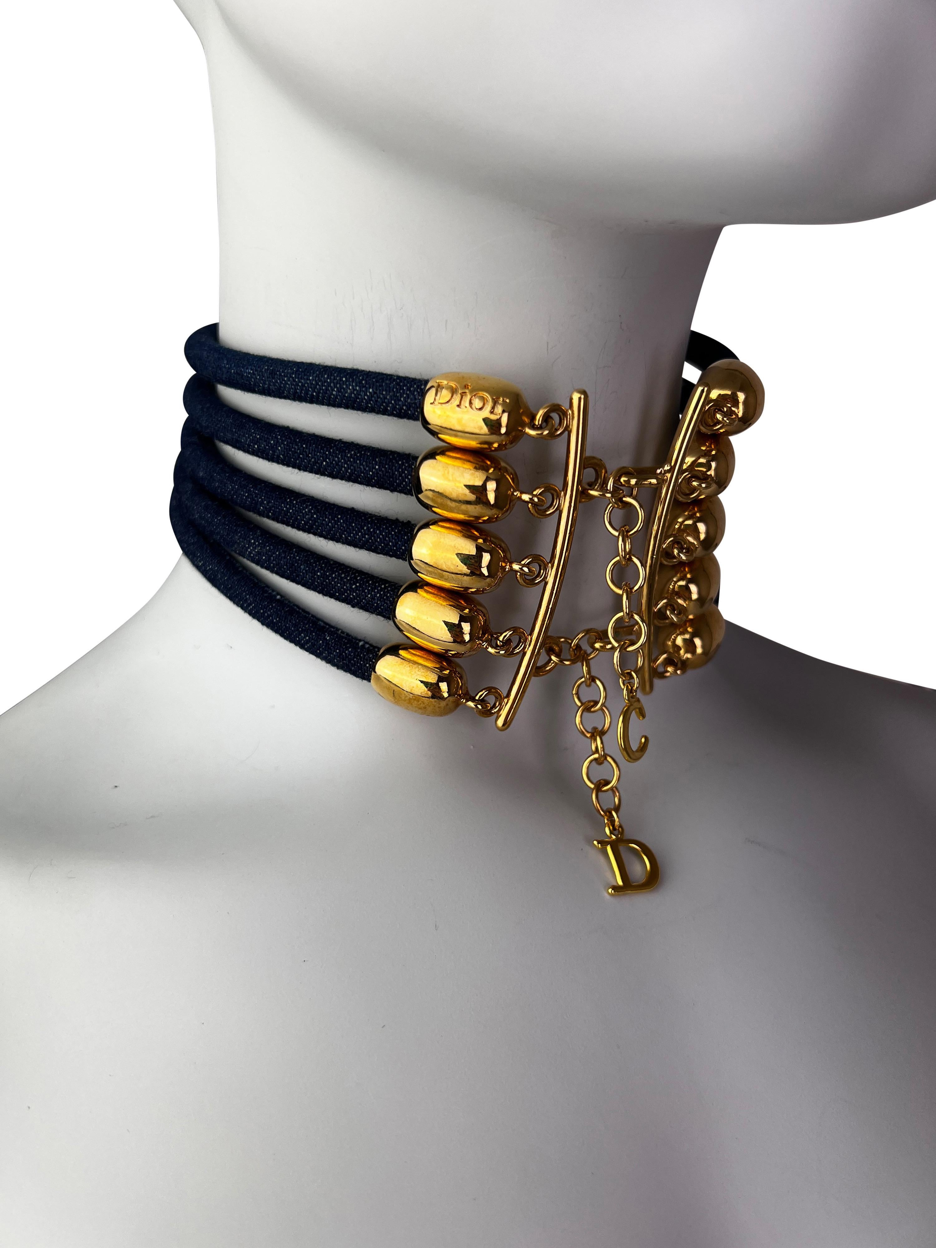 A rare chocker from Spring 2000 collection from denim ropes and gorgeous 24k gold-plated hardware with CD letters and a large Dior embossing. We re-plated the letters as they lost some plating, hence the shade of gold may slightly differ, but it’s