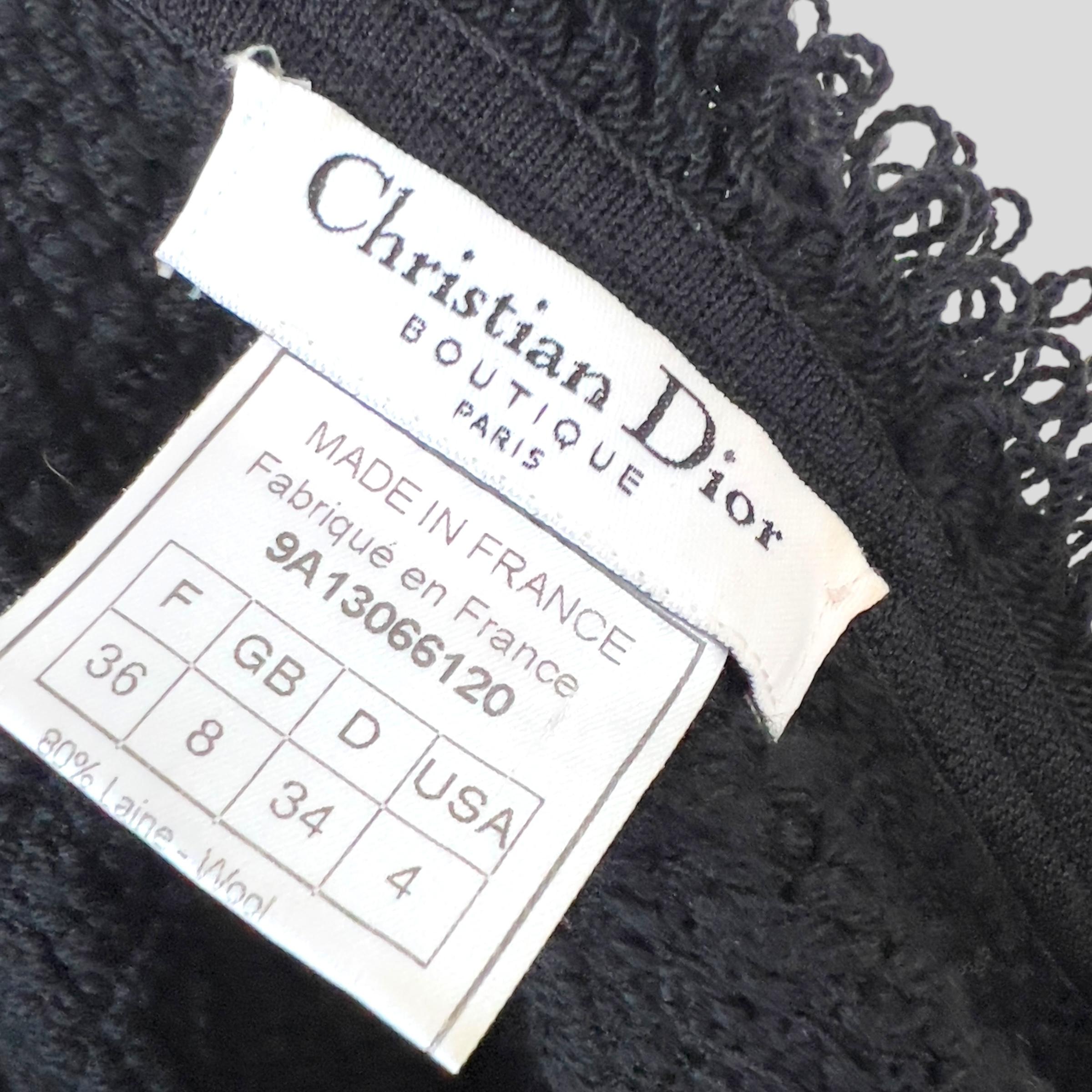
Piece Description: From Dior's Fall/Winter 1999 collection, aptly titled “Sportswear”, this dress reflects John Galliano’s unmatched ability to infuse classic designs with contemporary glamour. Crafted from a textured stretch jacquard wool blend