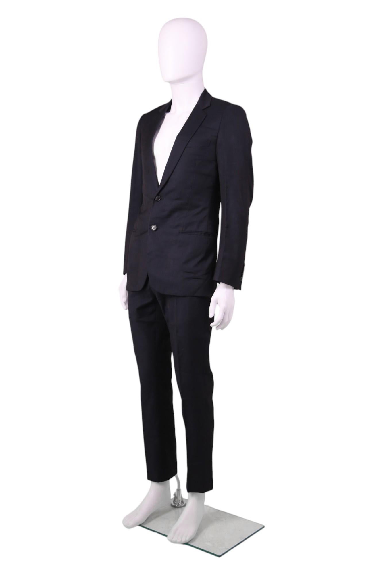 - Designed by Kris Van Assche
- Fall winter 2010
- Blue Virgin Wool Suit
- Double buttons closure
- Double frontal pockets
- Hook closure
- Very good condition: just some little holes at the buttocks
- Made in Italy
- Materials: Virgin Wool
- Size: