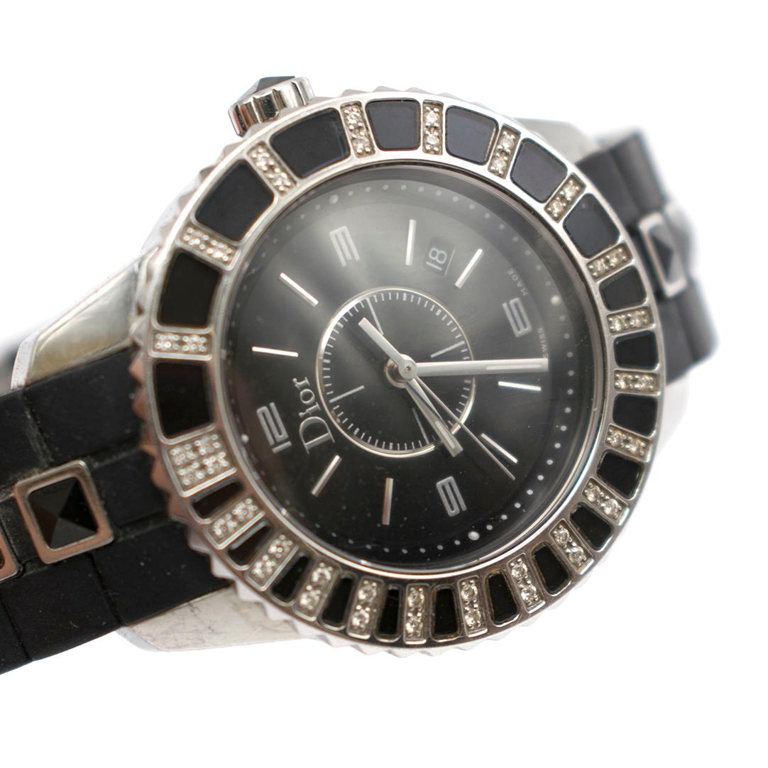 Dior Christal Diamond and Sapphire Ladies Watch

- Christal Series
- Model CD113115R001
- 0.30ct Diamonds ( 60 individuals small diamonds)
- Rubber Strap with Black Sapphires 
- Black dial with luminous hands and stick hour markers
- Quartz